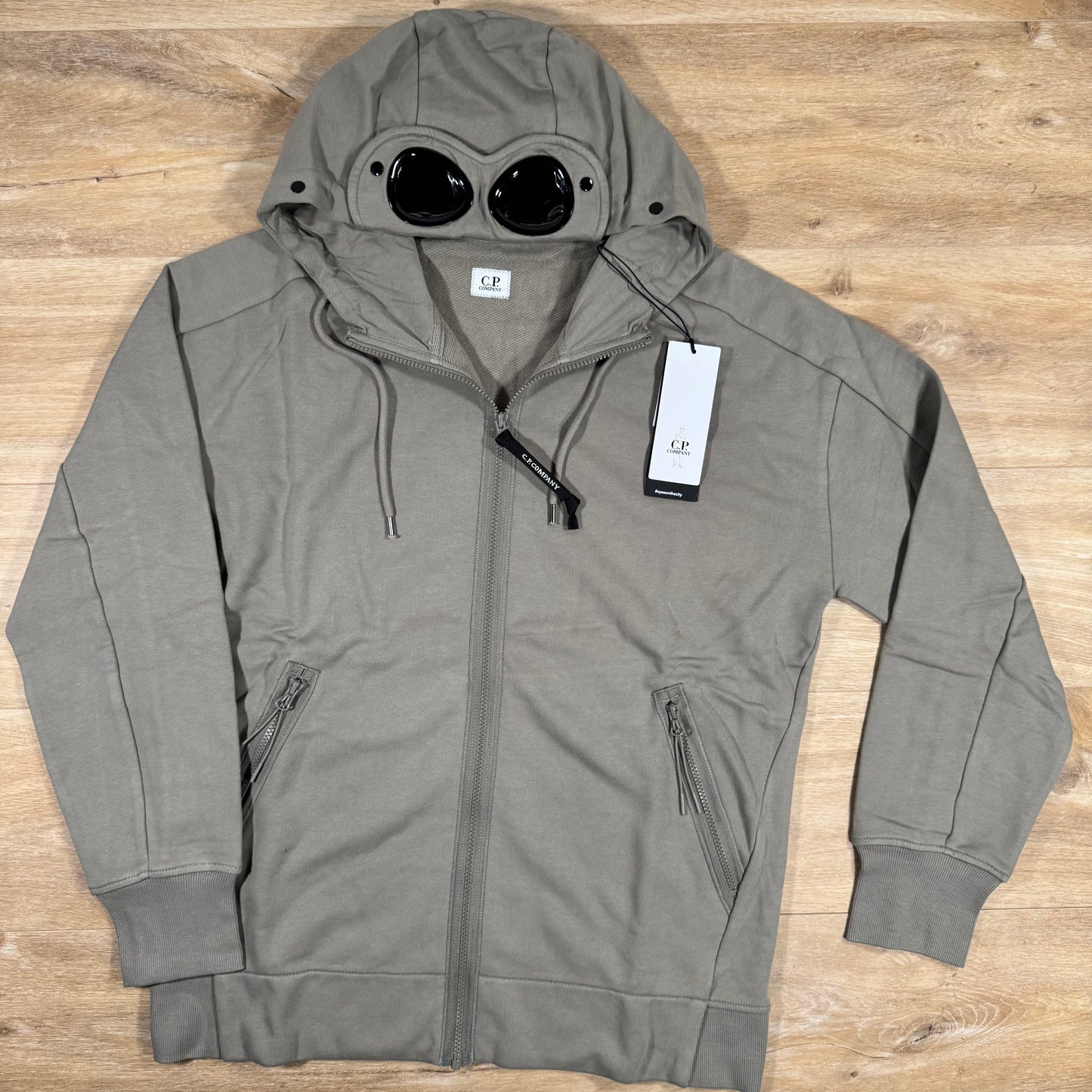 C.P. Company Diagonal Raised Fleece Goggle Hoodie in Fungi Grey