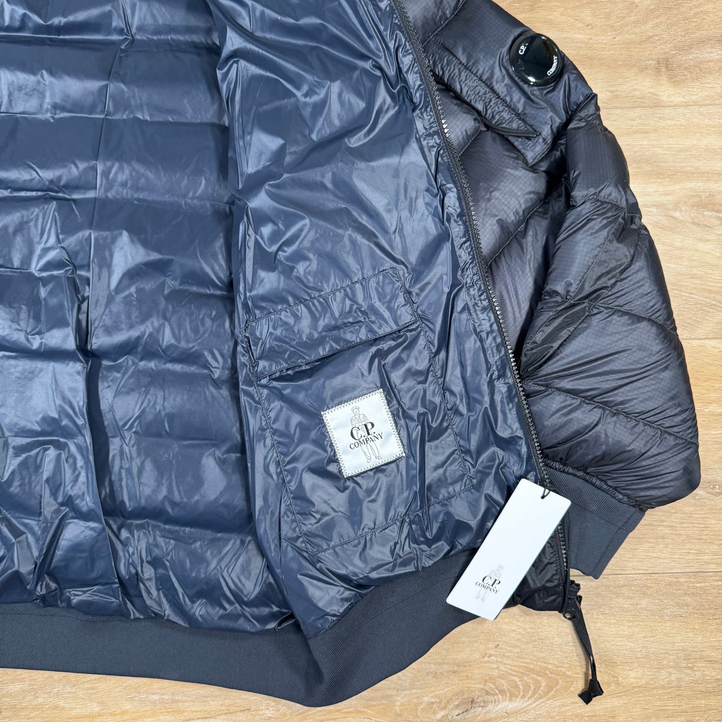 C.P. Company D.D. Shell Lens Down Jacket in Navy