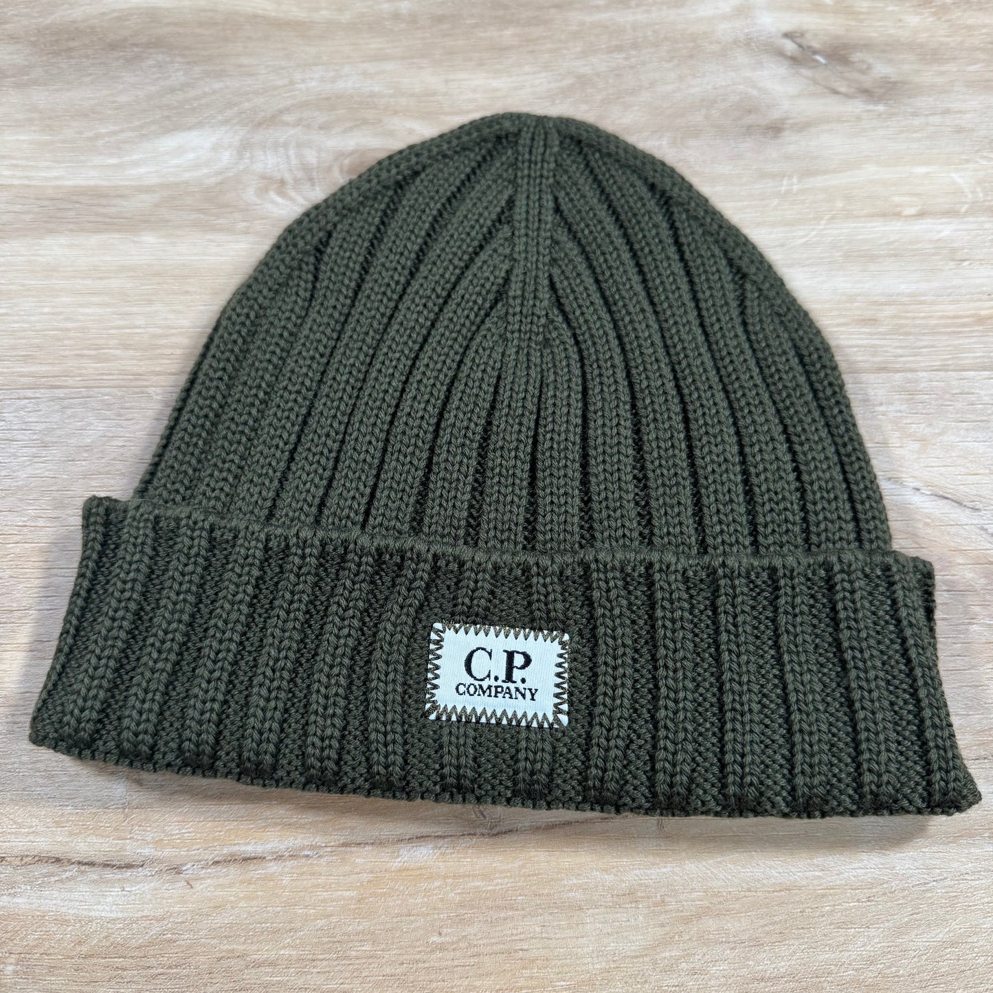 C.P. Company Extra Fine Merino Wool Logo Beanie in Ivy Green