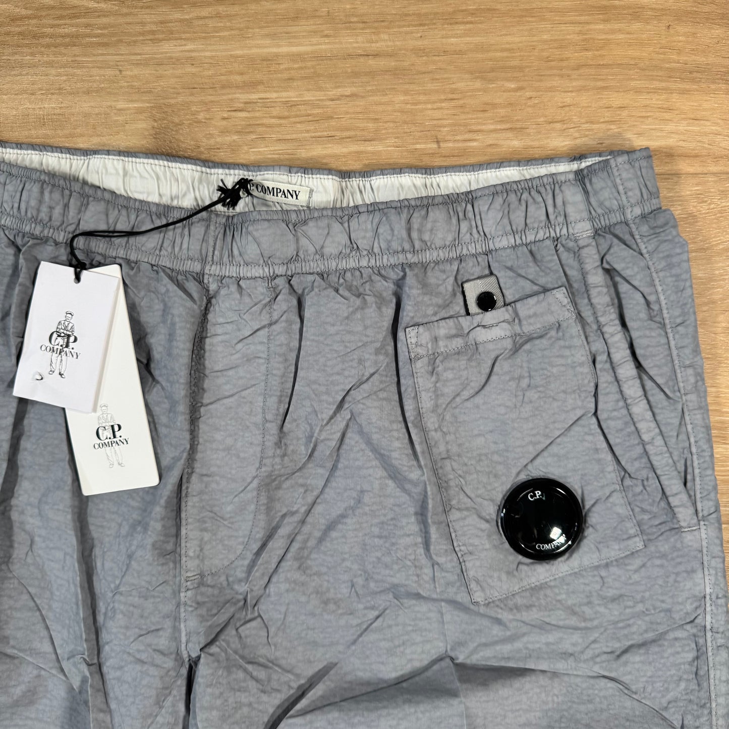 C.P. Company Flatt Nylon Lens Swim Shorts in Limestone - Grey