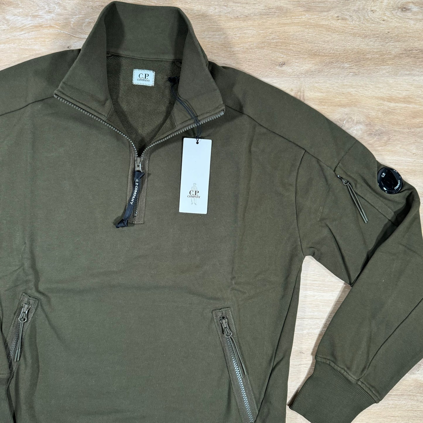 C.P. Company Diagonal Raised Half-Zipped Lens Sweatshirt in Ivy Green