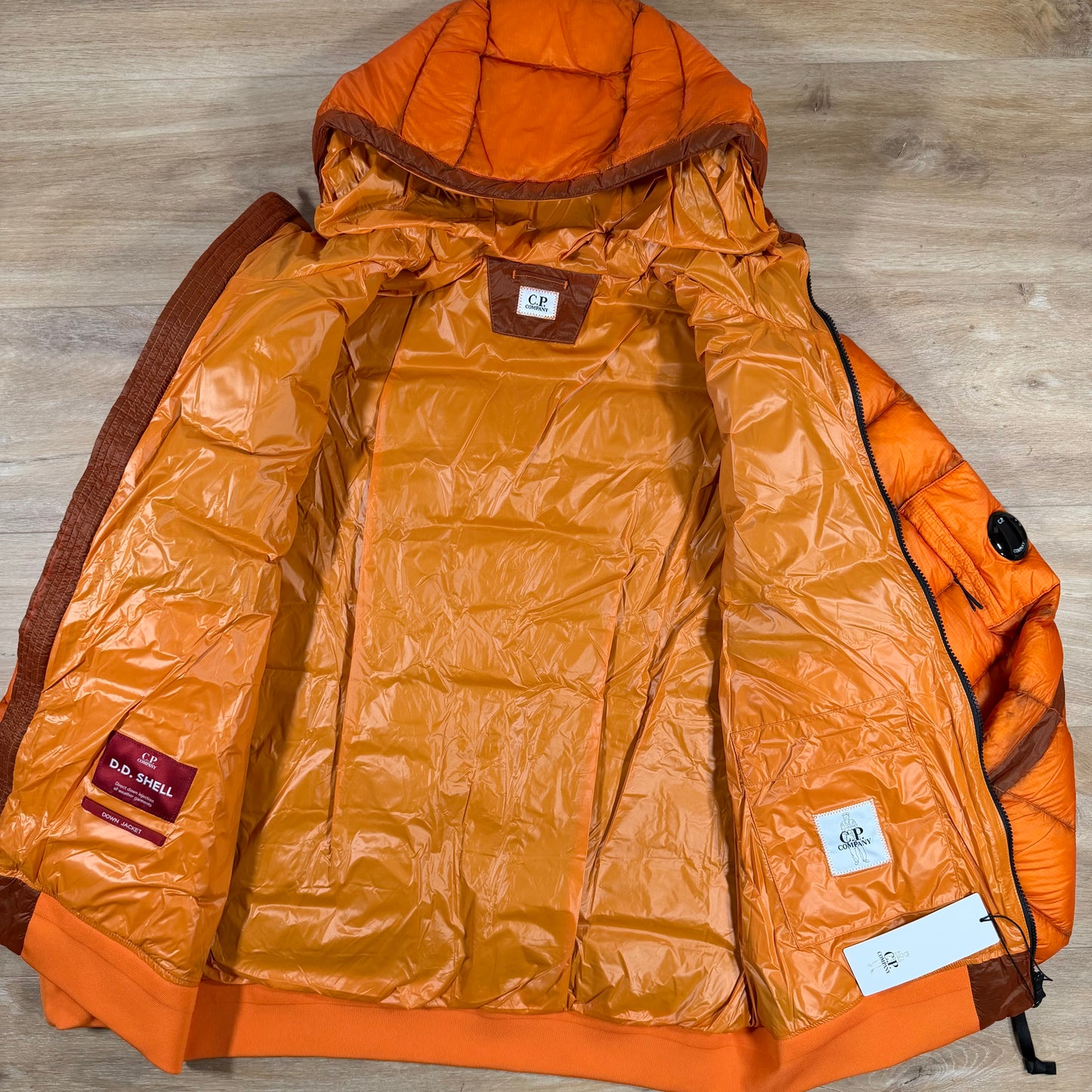 C.P. Company D.D. Shell Lens Down Jacket in Russet Orange