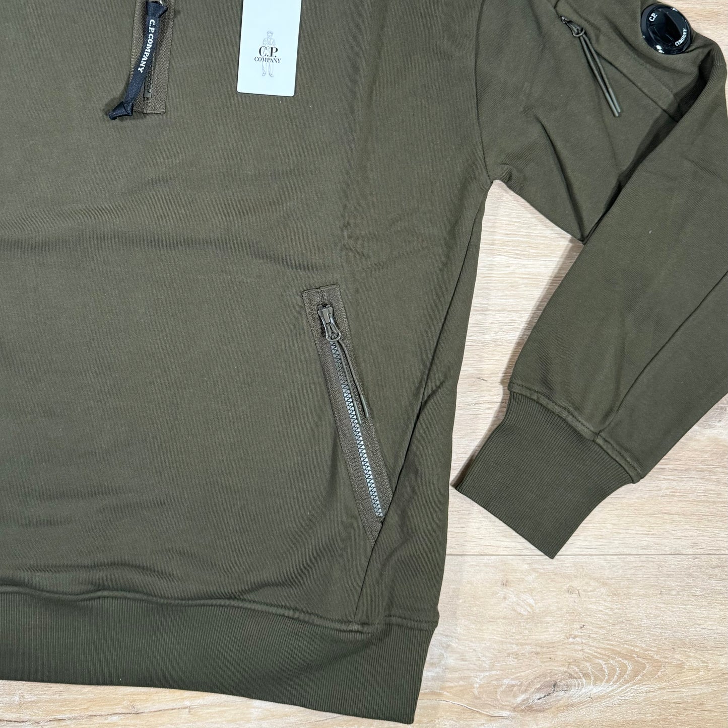 C.P. Company Diagonal Raised Half-Zipped Lens Sweatshirt in Ivy Green