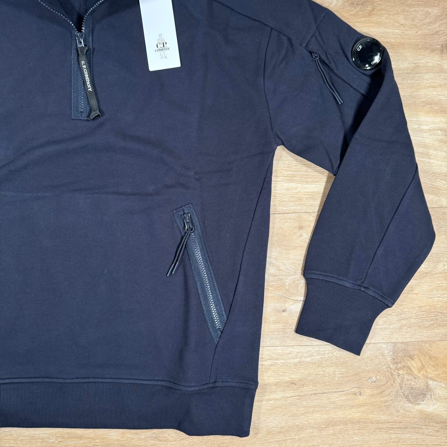 C.P. Company Diagonal Raised Half-Zipped Lens Sweatshirt in Navy