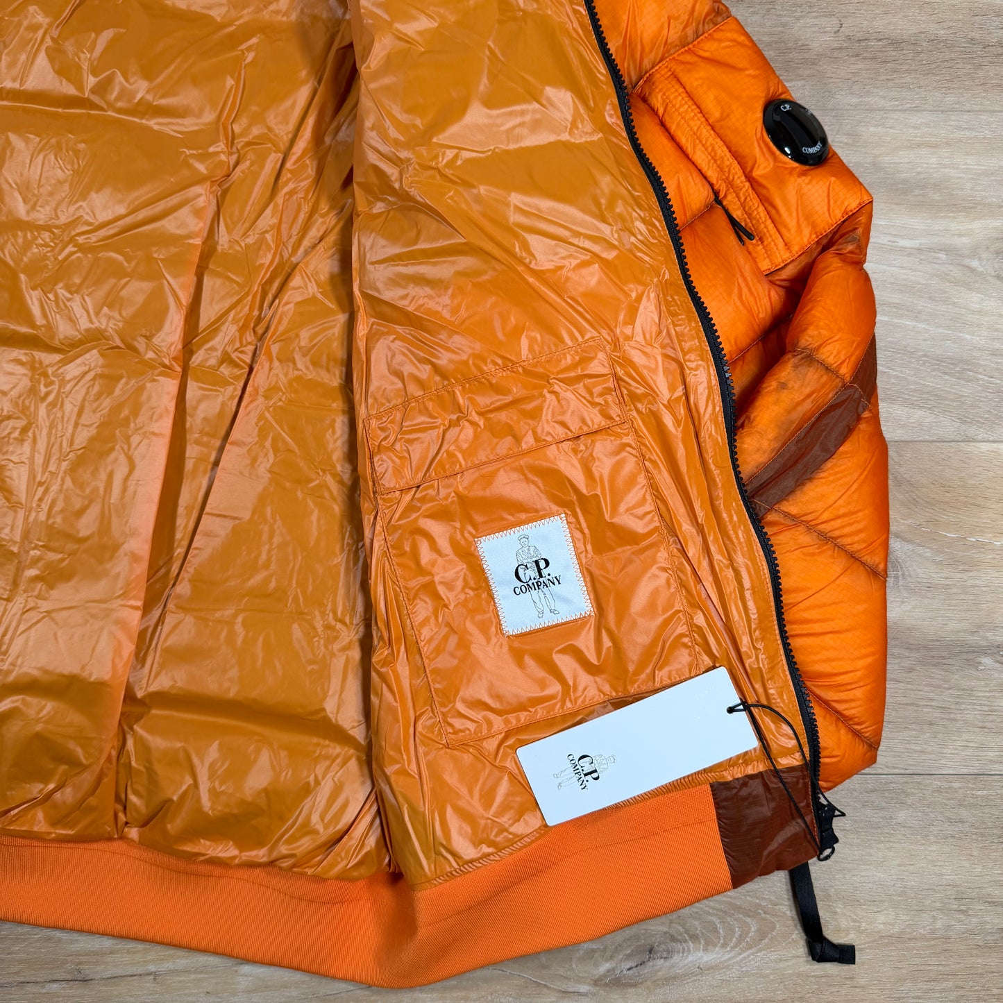 C.P. Company D.D. Shell Lens Down Jacket in Russet Orange