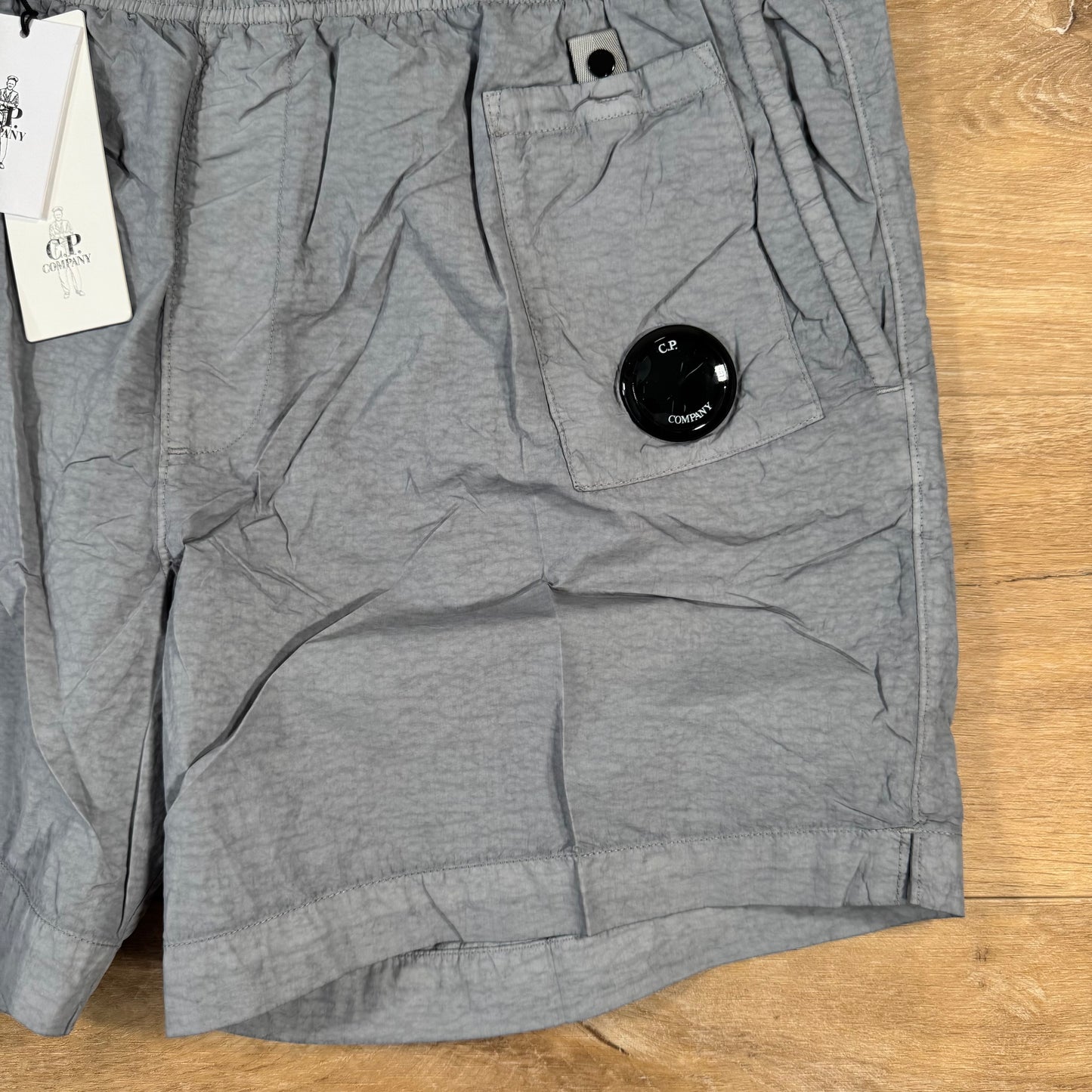 C.P. Company Flatt Nylon Lens Swim Shorts in Limestone - Grey