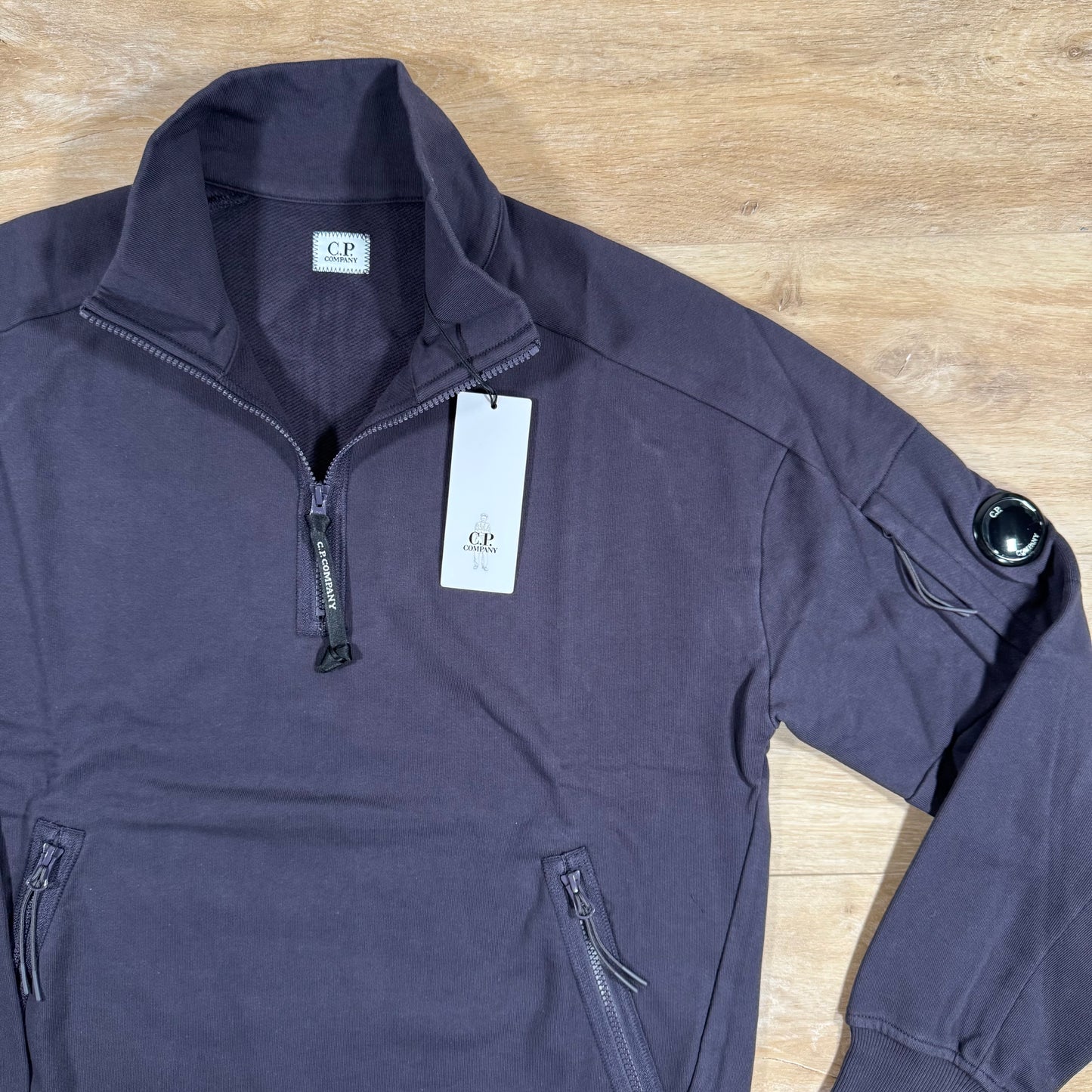 C.P. Company Diagonal Raised Half-Zipped Lens Sweatshirt in Nightshade Purple