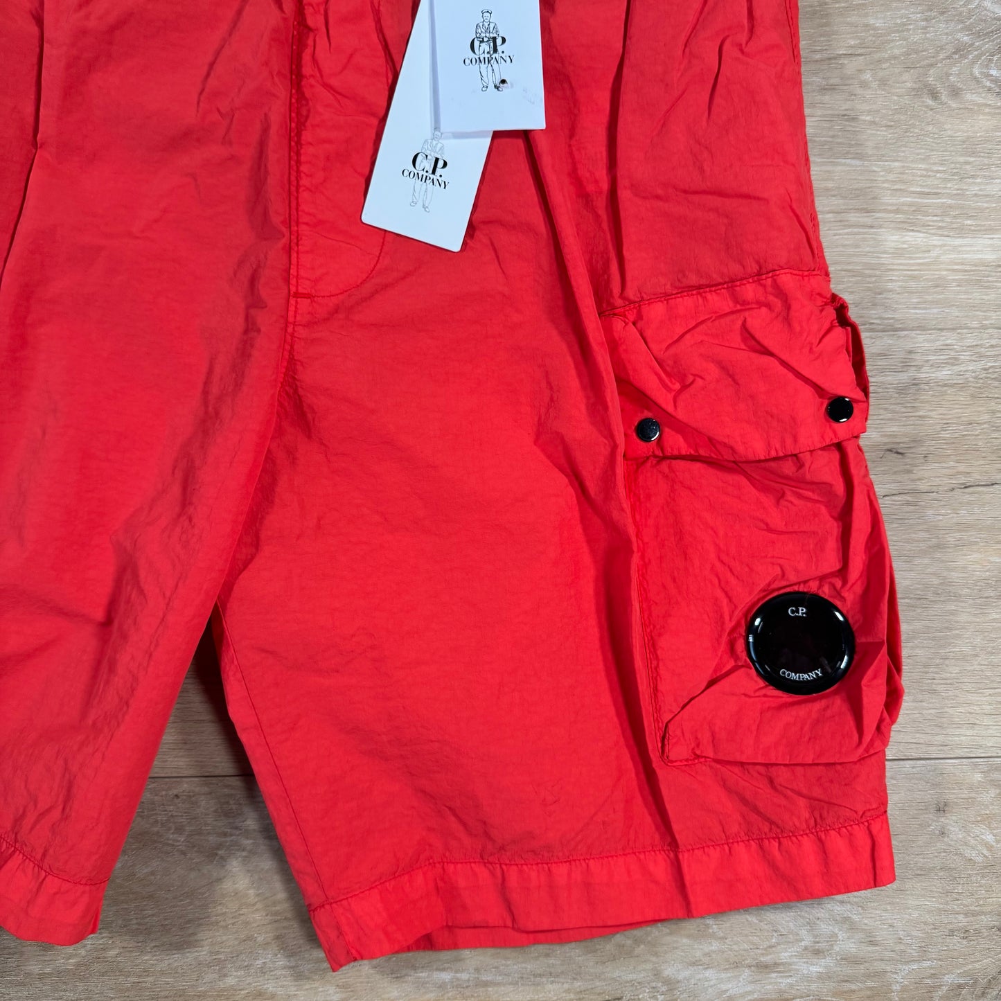 C.P. Company Flatt Nylon Cargo Lens Swim Shorts in Poinciana - Orange