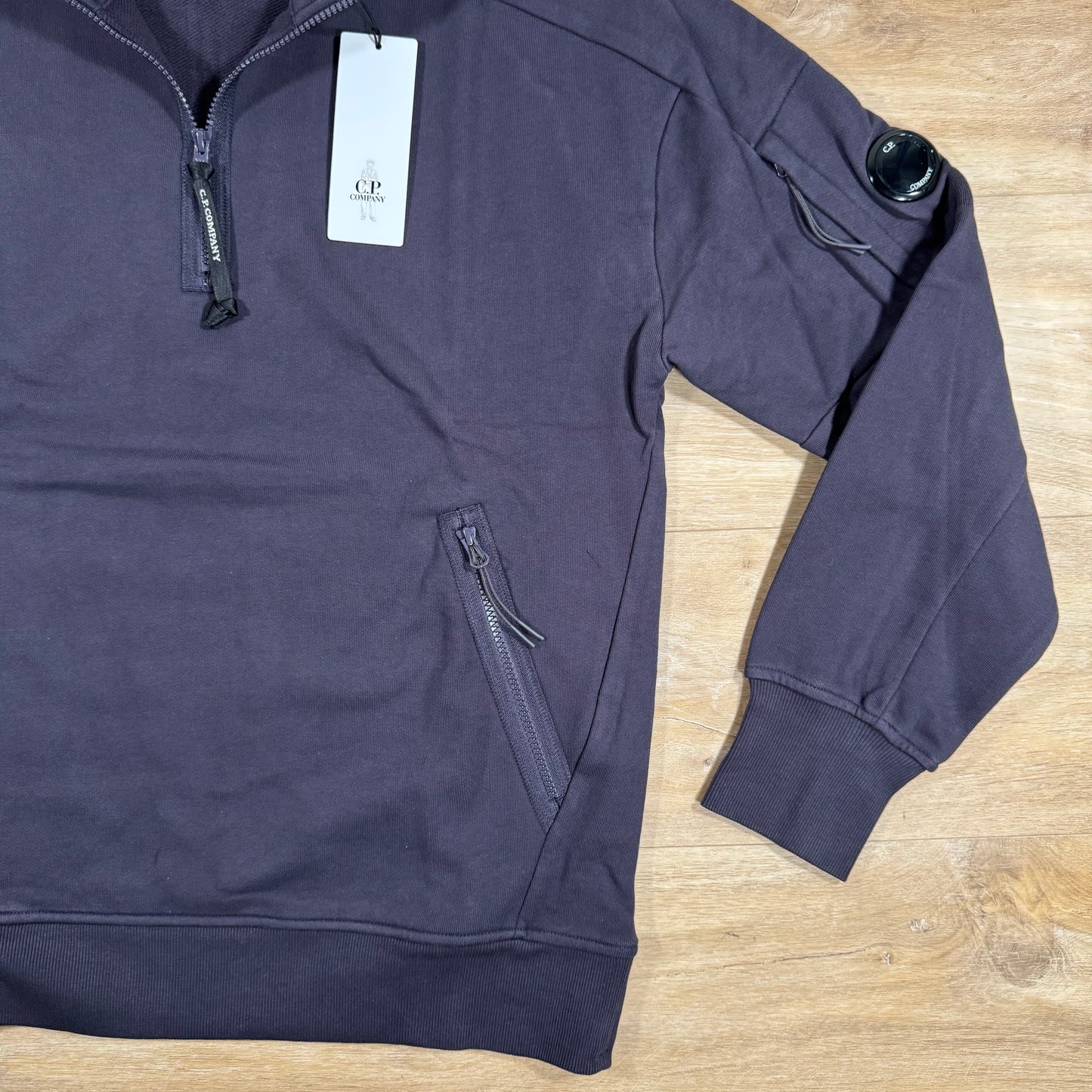 C.P. Company Diagonal Raised Half-Zipped Lens Sweatshirt in Nightshade Purple