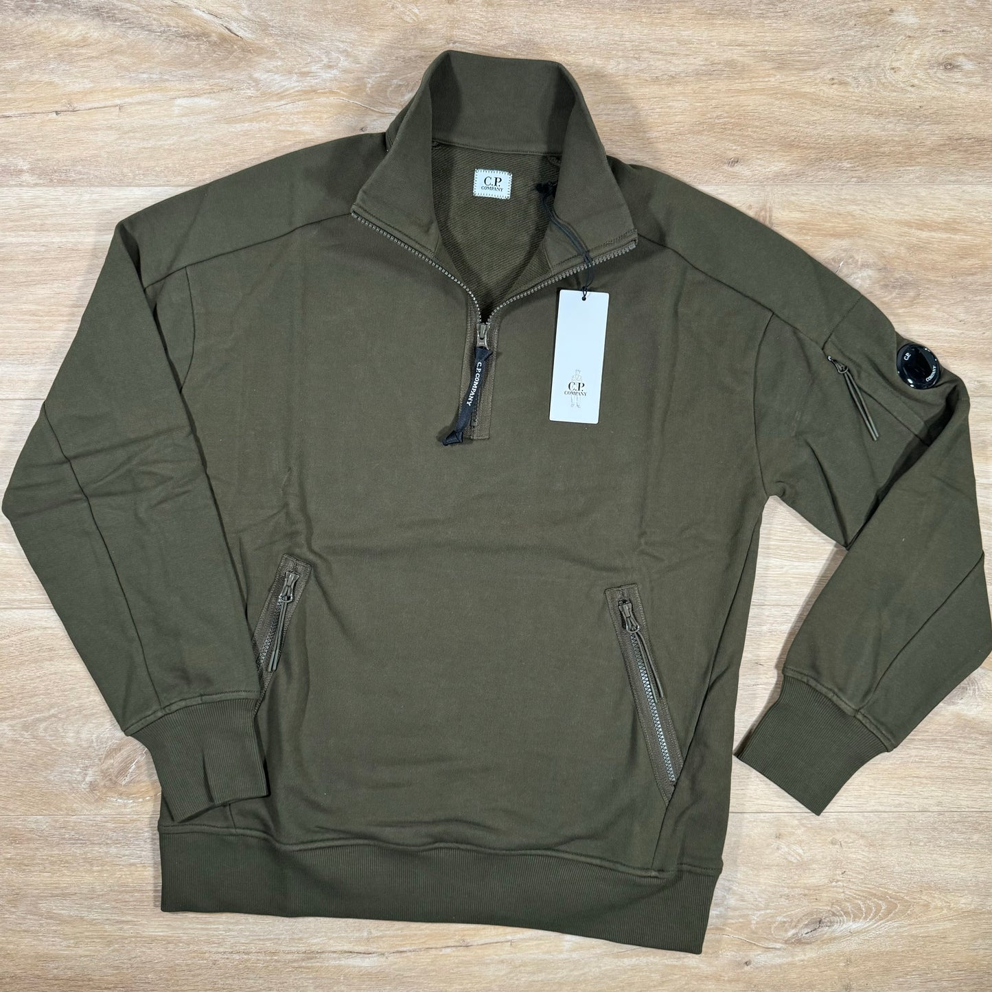 C.P. Company Diagonal Raised Half-Zipped Lens Sweatshirt in Ivy Green