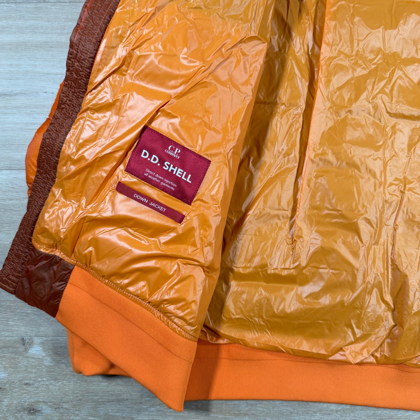 C.P. Company D.D. Shell Lens Down Jacket in Russet Orange