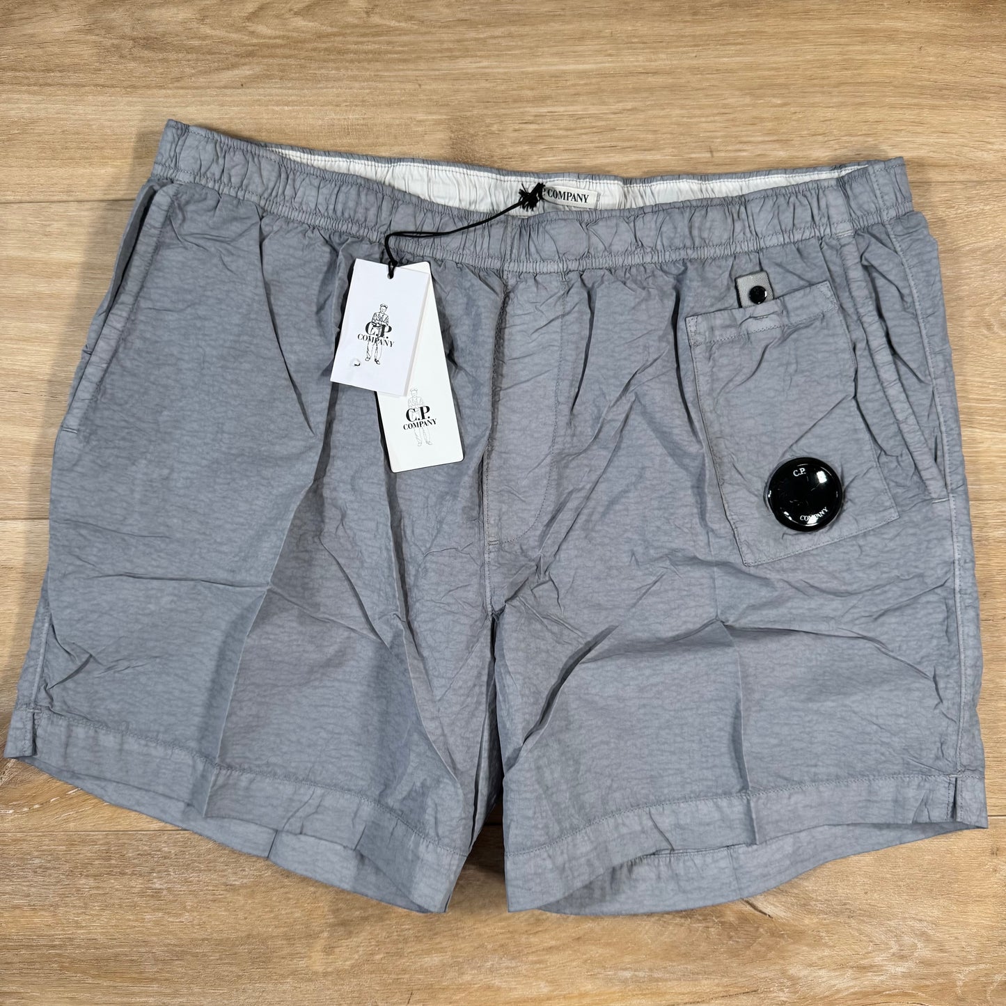 C.P. Company Flatt Nylon Lens Swim Shorts in Limestone - Grey