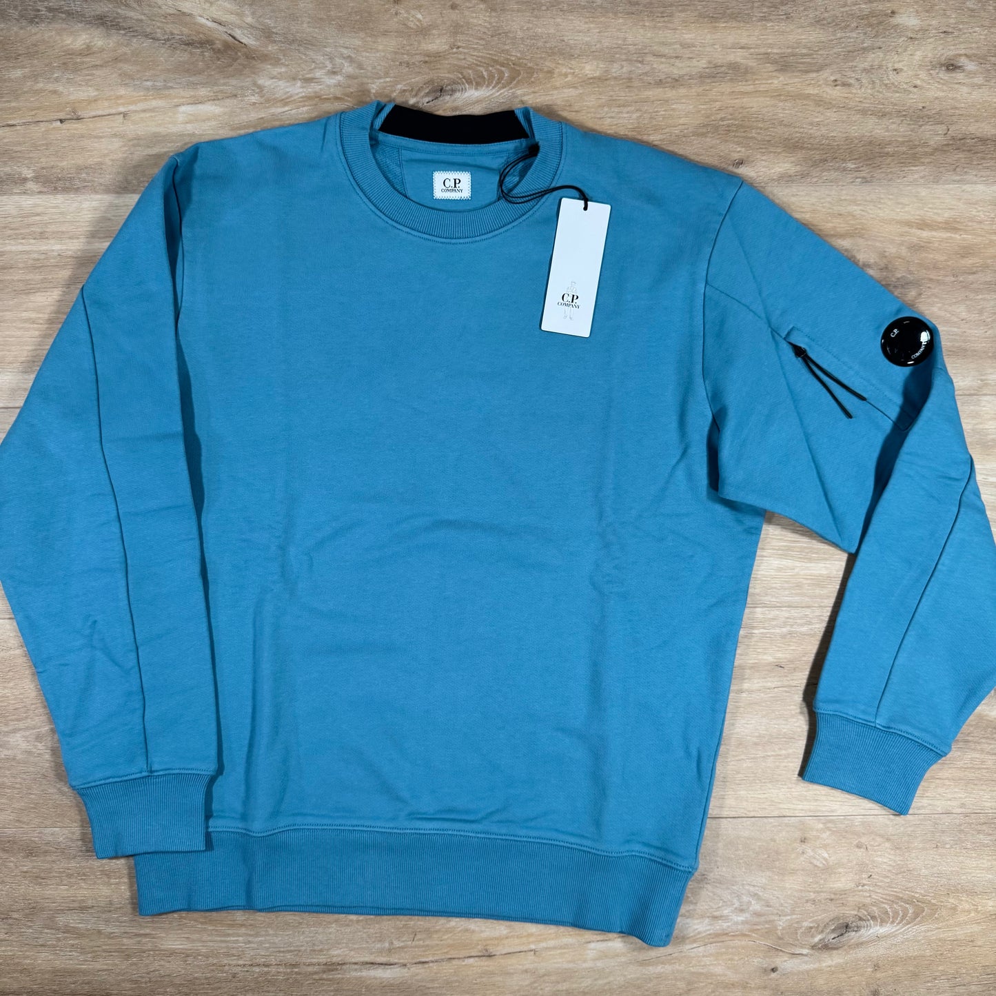 C.P. Company Diagonal Raised Fleece Crewneck Lens Sweatshirt in Aegean Blue