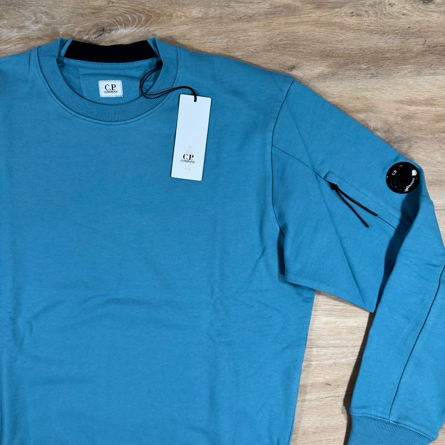 C.P. Company Diagonal Raised Fleece Crewneck Lens Sweatshirt in Aegean Blue
