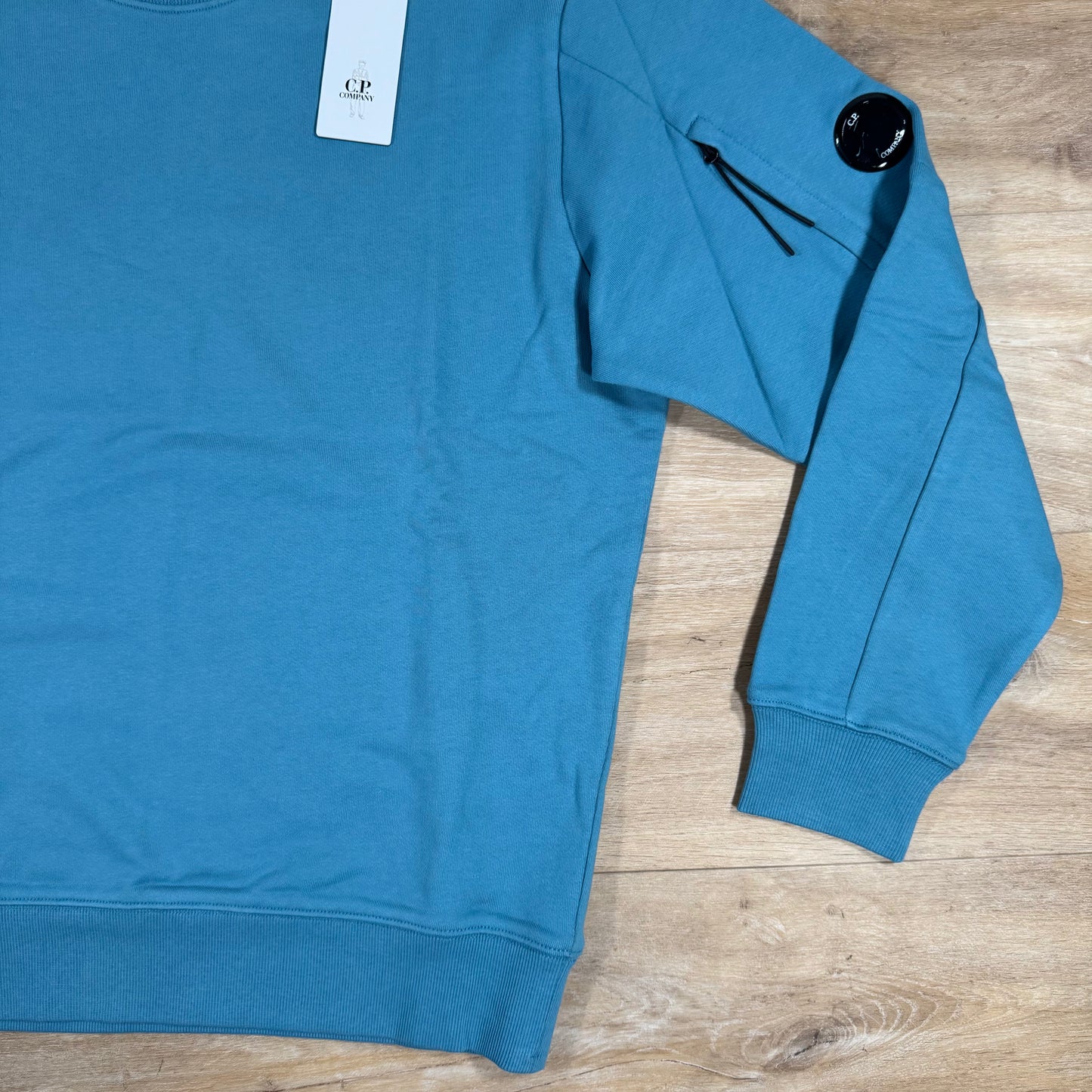 C.P. Company Diagonal Raised Fleece Crewneck Lens Sweatshirt in Aegean Blue