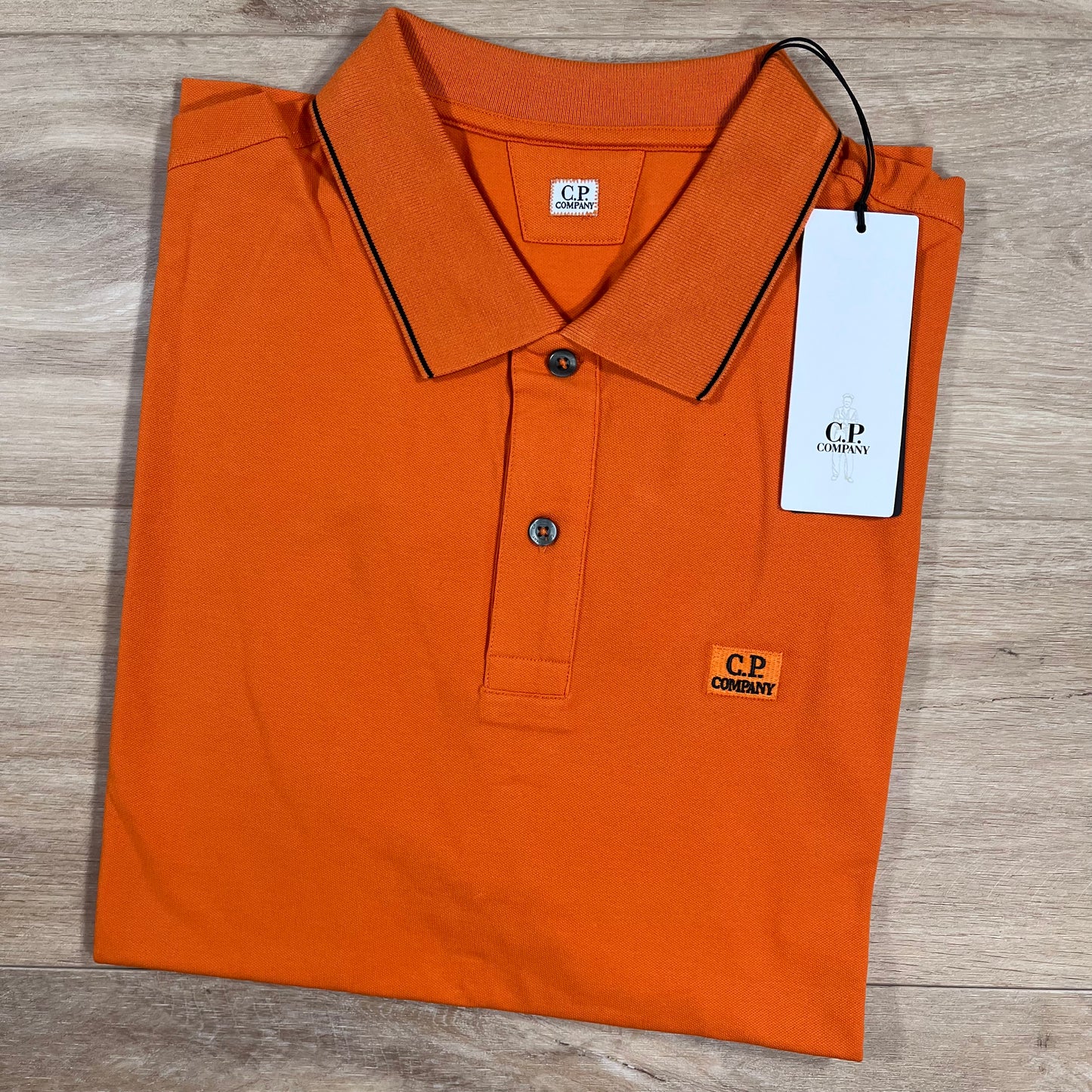 C.P. Company Stretch Piquet Striped Collar Polo Shirt in Russet Orange