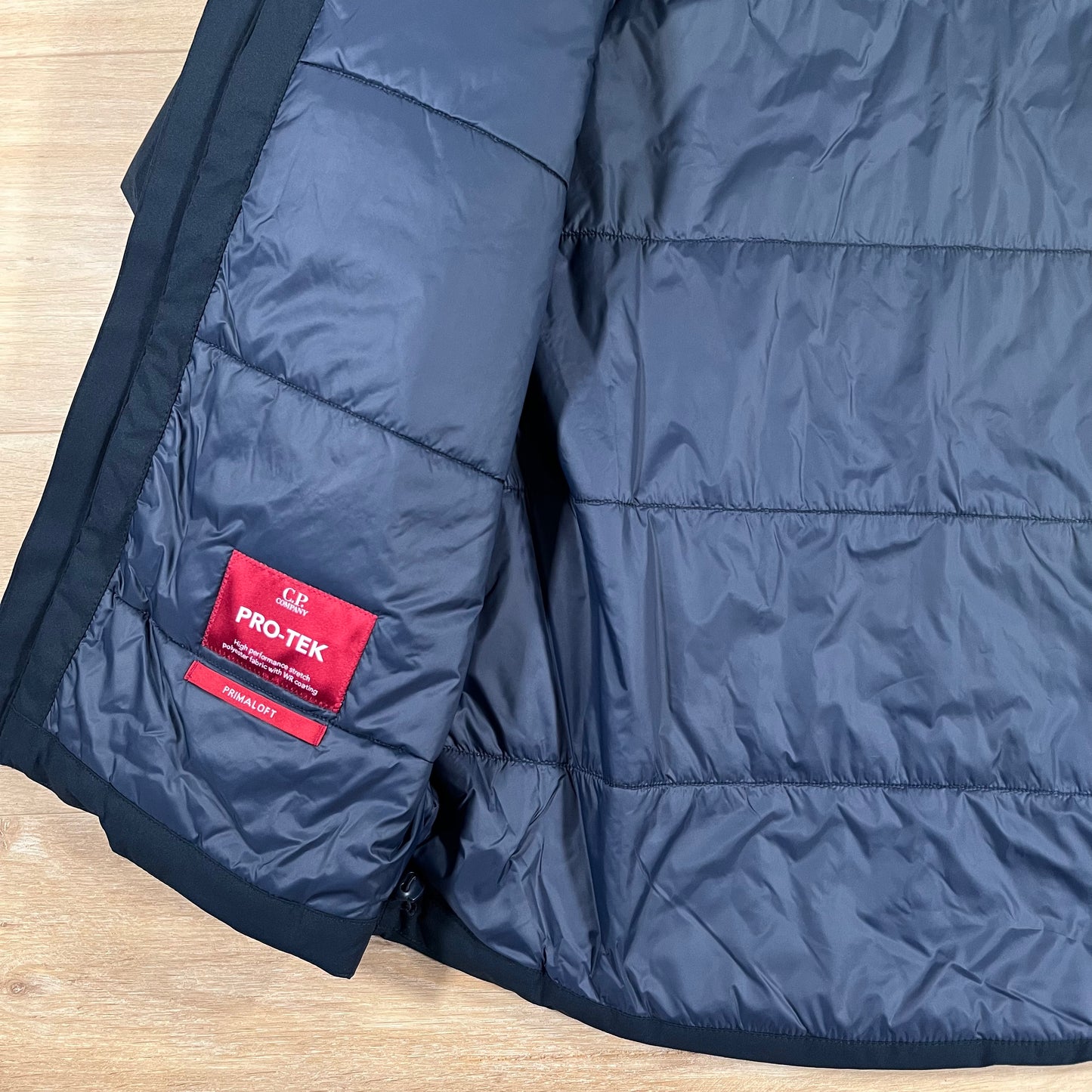 C.P. Company Pro-Tek Padded Lens Jacket in Navy