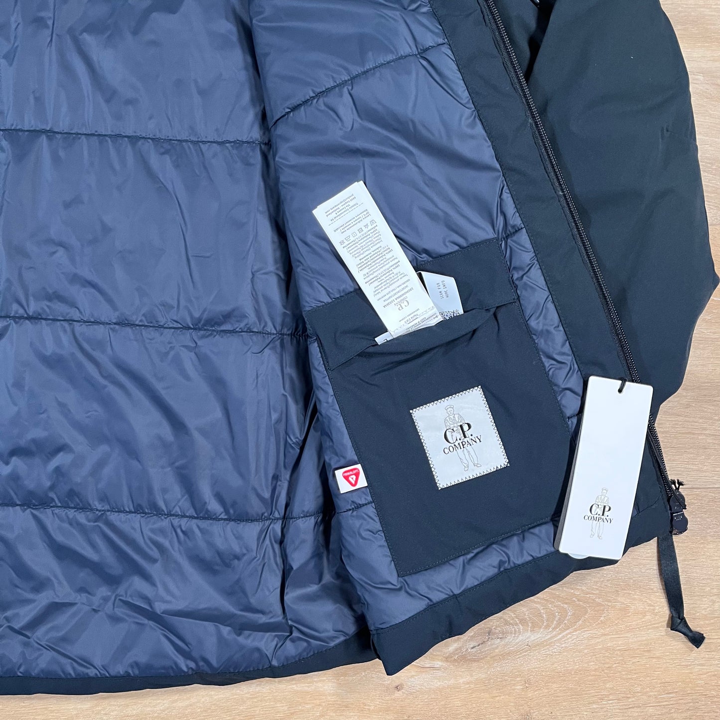 C.P. Company Pro-Tek Padded Lens Jacket in Navy