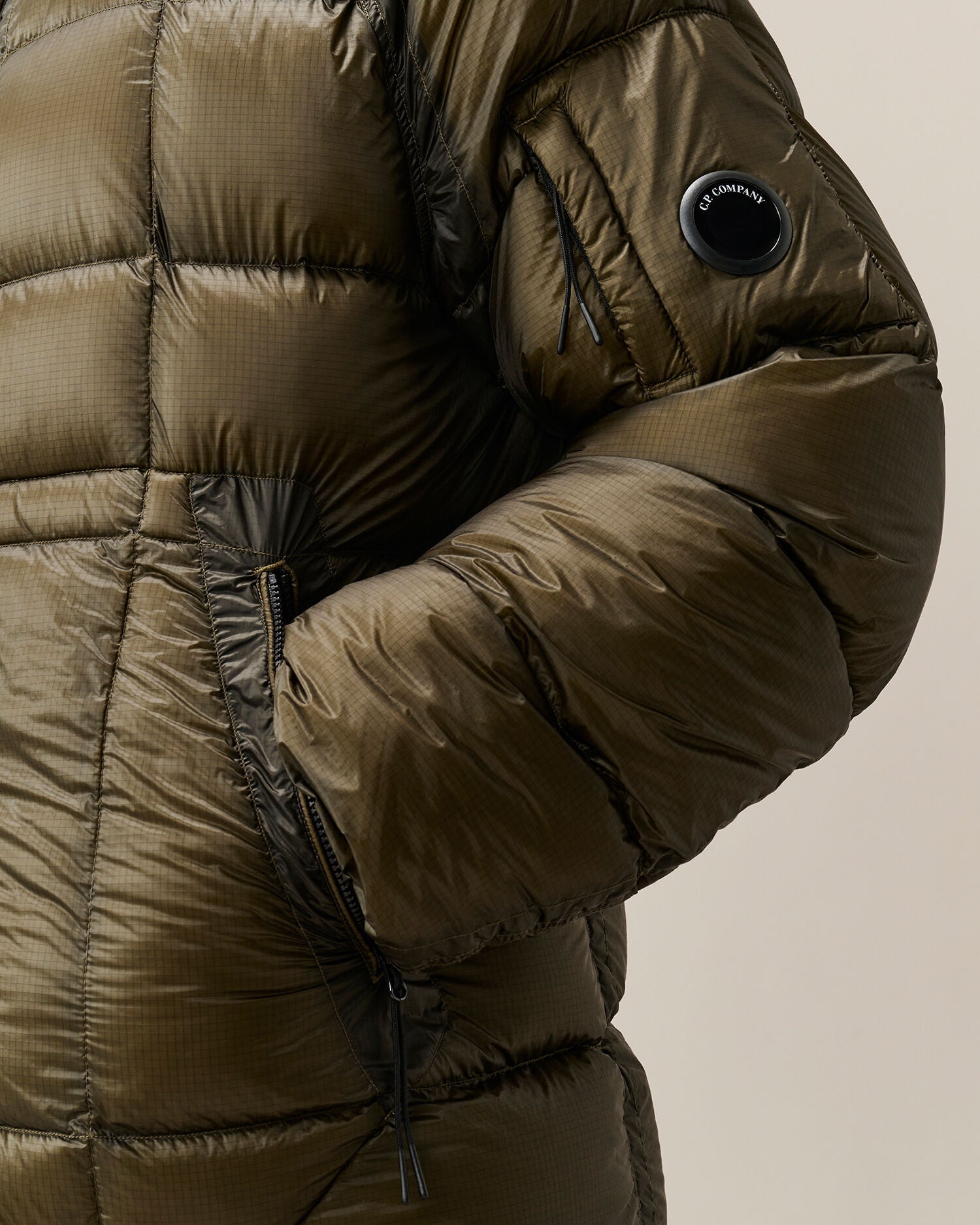 C.P. Company D.D. Shell Lens Puffer Jacket in Ivy Green