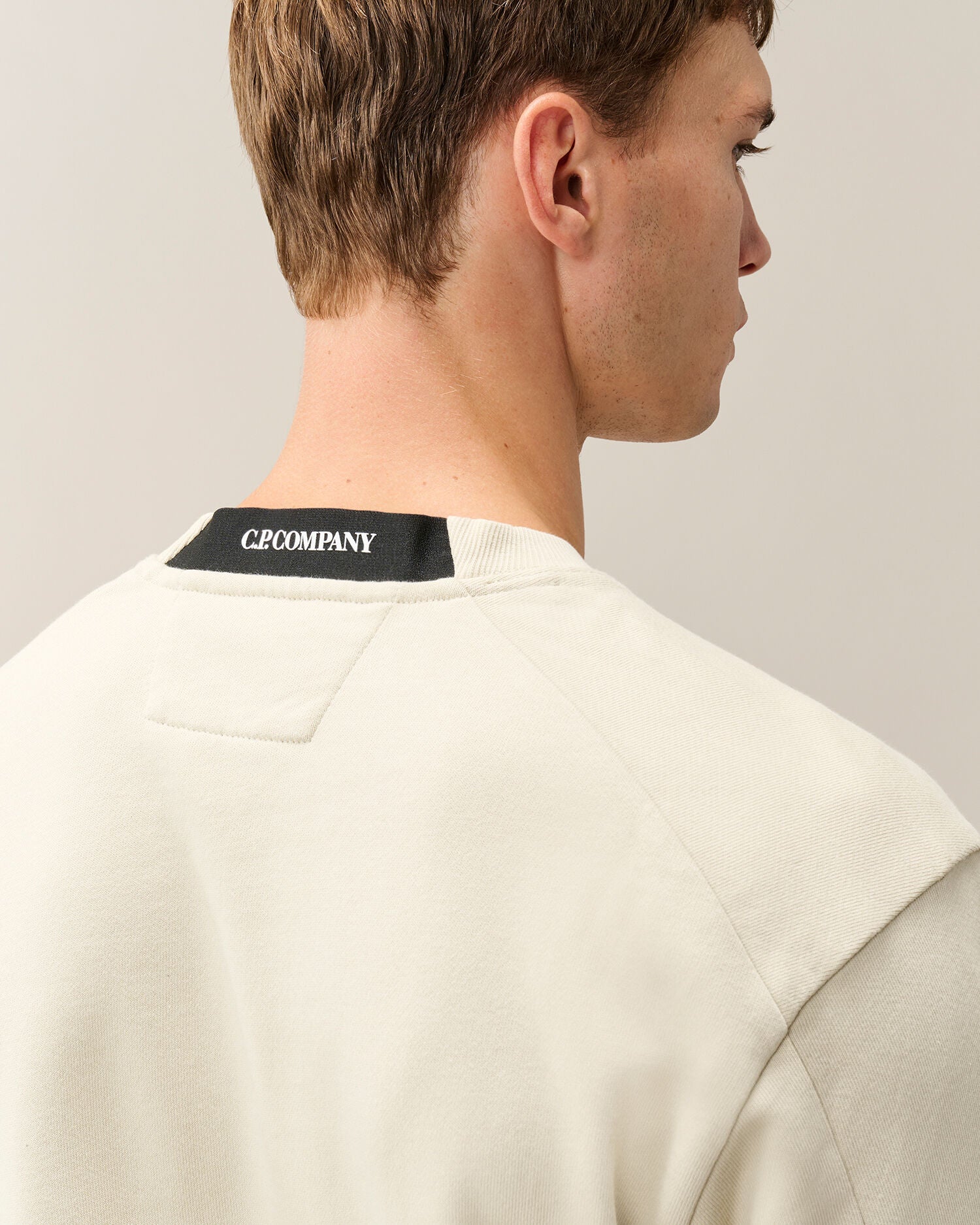 C.P. Company Diagonal Raised Fleece Crewneck Lens Sweatshirt in Silver Birch