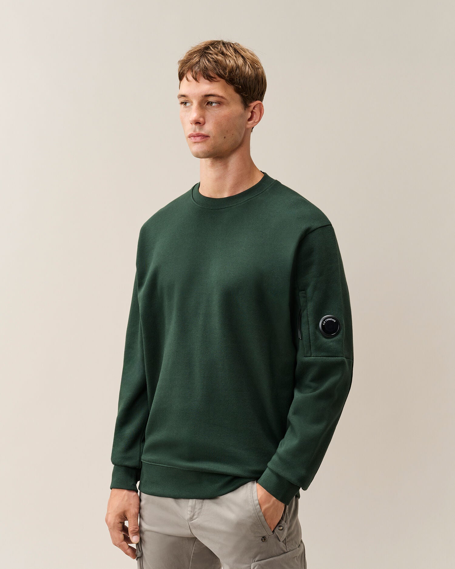 C.P. Company Diagonal Raised Fleece Crewneck Lens Sweatshirt in Ponderosa Pine - Green