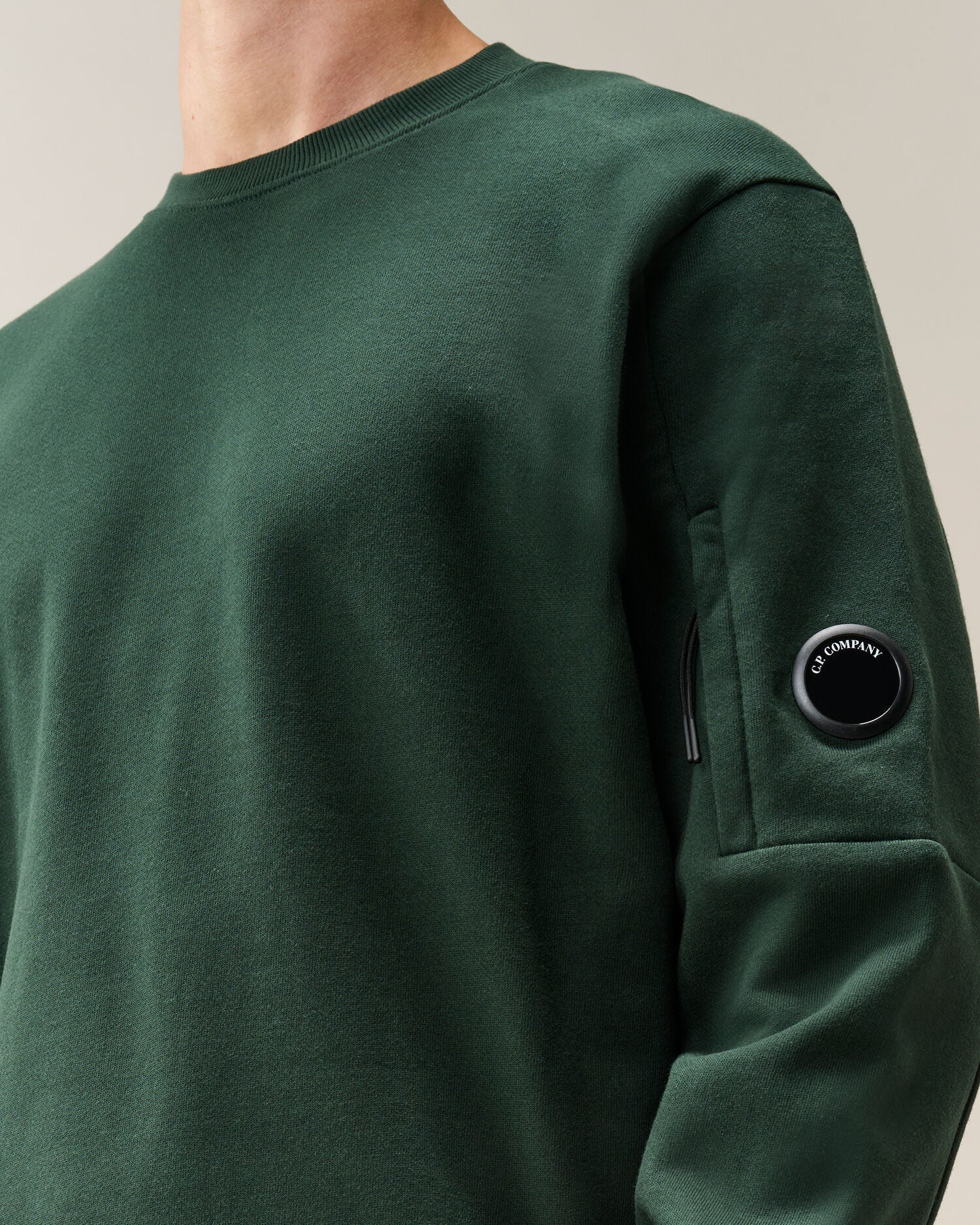 C.P. Company Diagonal Raised Fleece Crewneck Lens Sweatshirt in Ponderosa Pine - Green