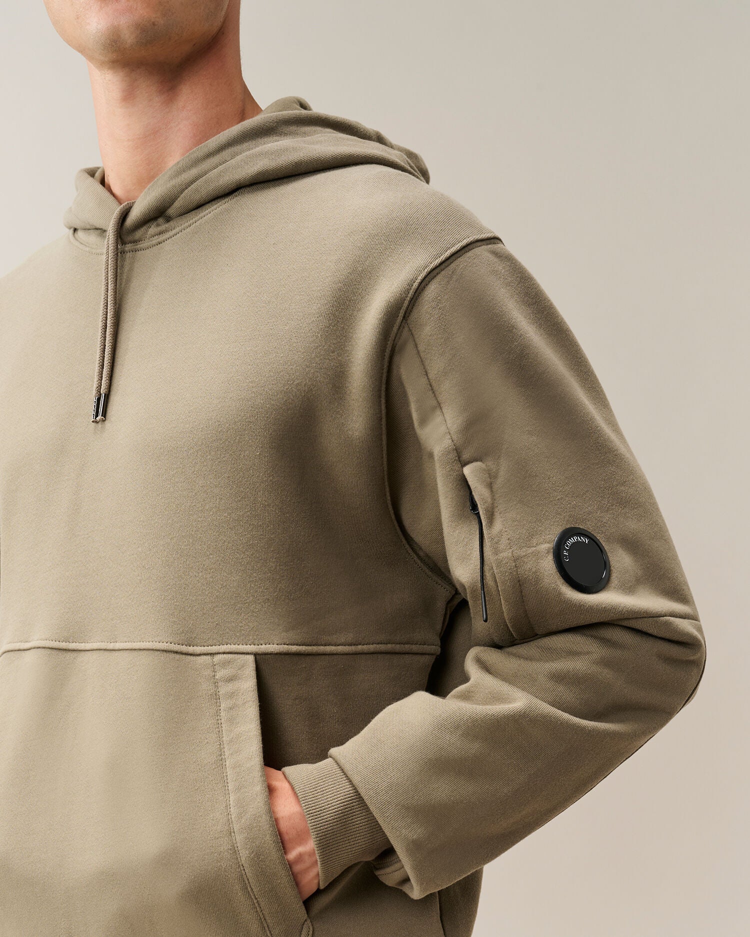C.P. Company Diagonal Raised Fleece Lens Hoodie in Fallen Rock - Beige