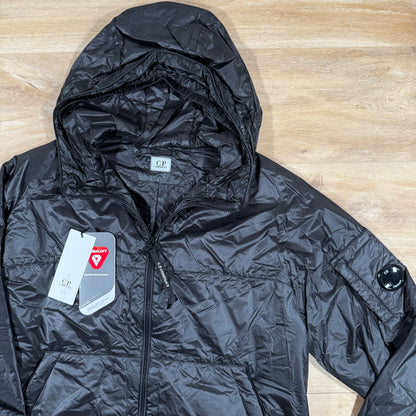 C.P. Company Nada Shell Lens Padded Jacket in Black
