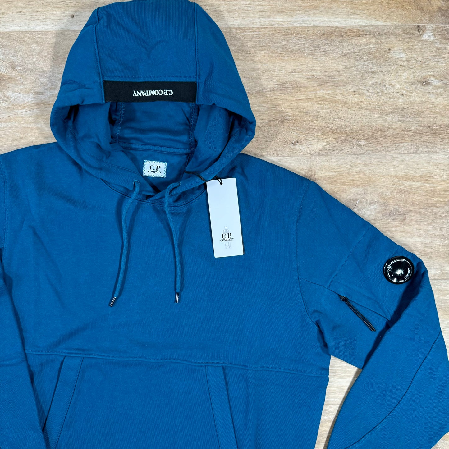 C.P. Company Diagonal Raised Lens Hoodie in Ink Blue