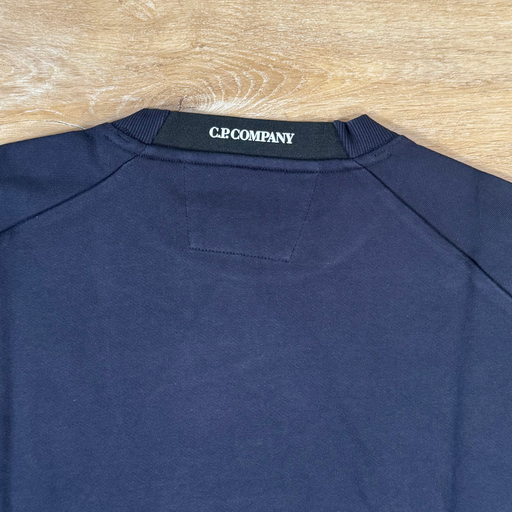 C.P. Company Diagonal Raised Fleece Crewneck Lens Sweatshirt in Navy