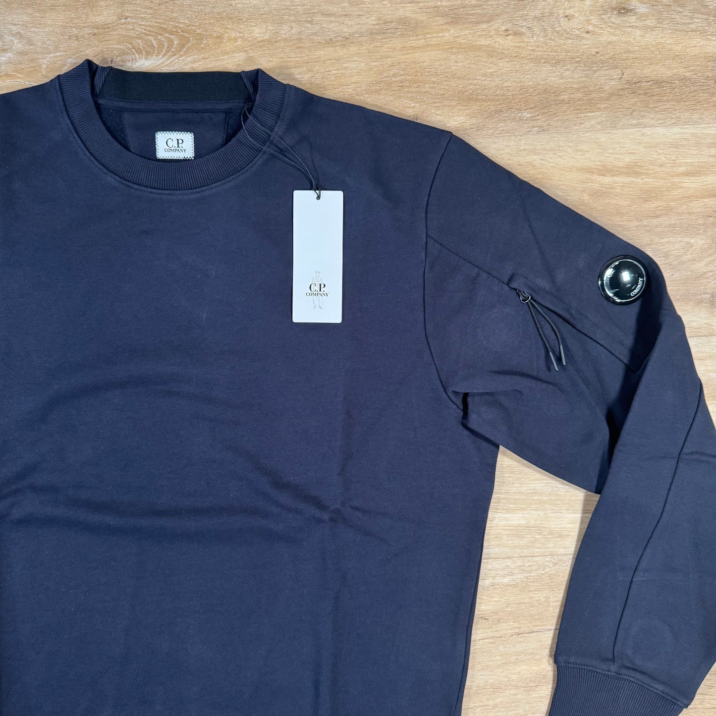 C.P. Company Diagonal Raised Fleece Crewneck Lens Sweatshirt in Navy