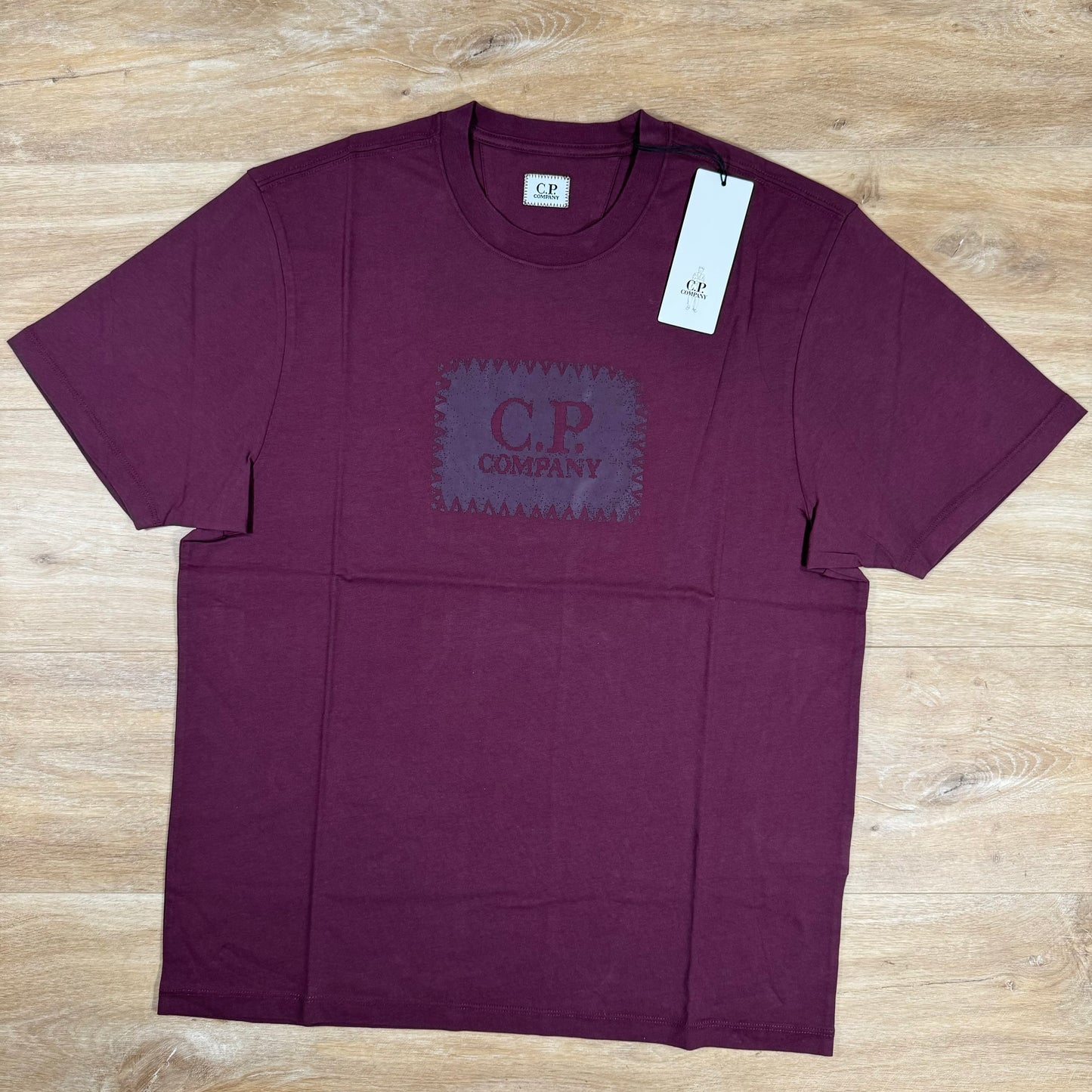 C.P. Company Stitch Block Logo T-Shirt in Potent Purple