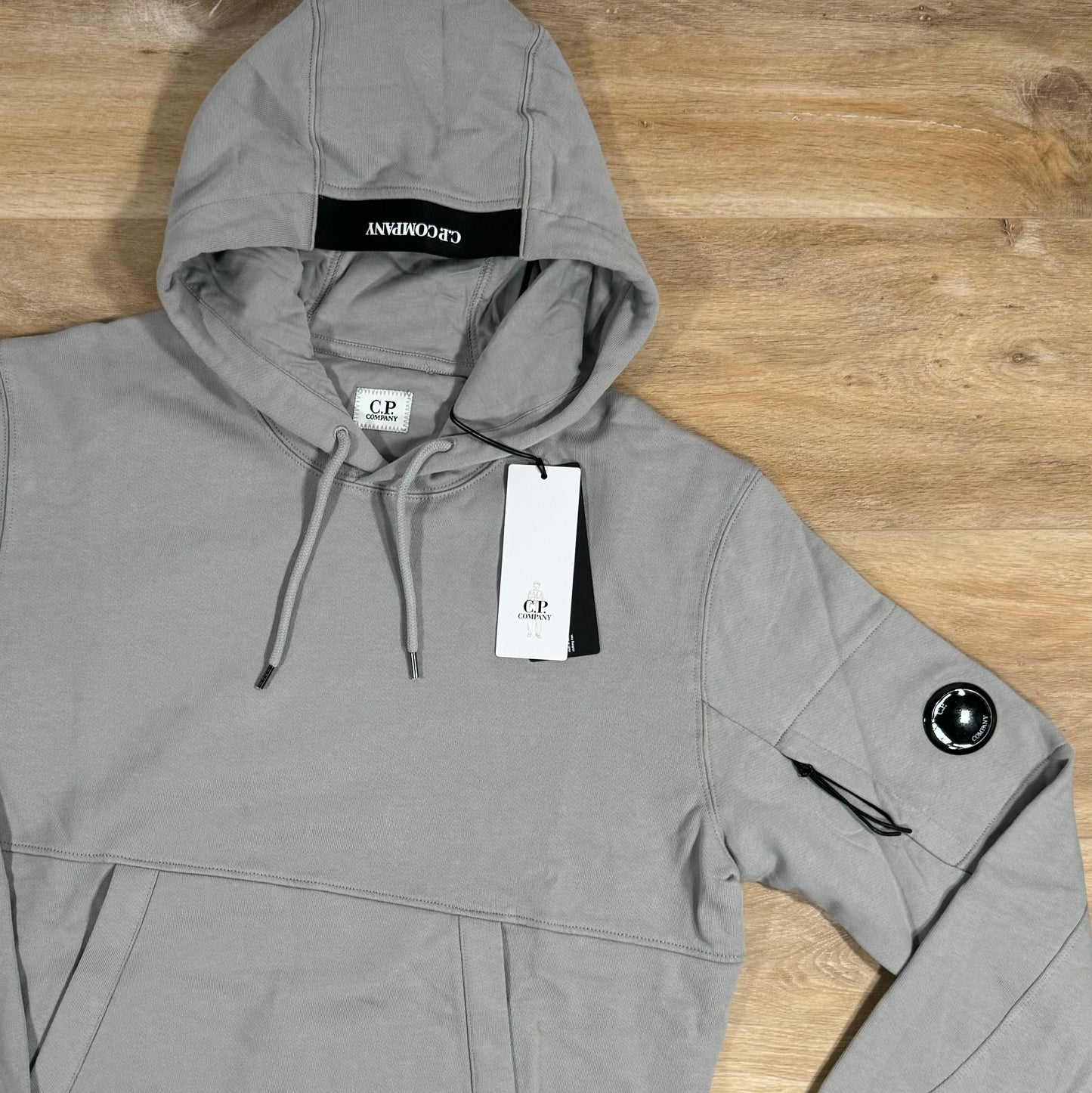 C.P. Company Diagonal Raised Lens Hoodie in Drizzle Grey