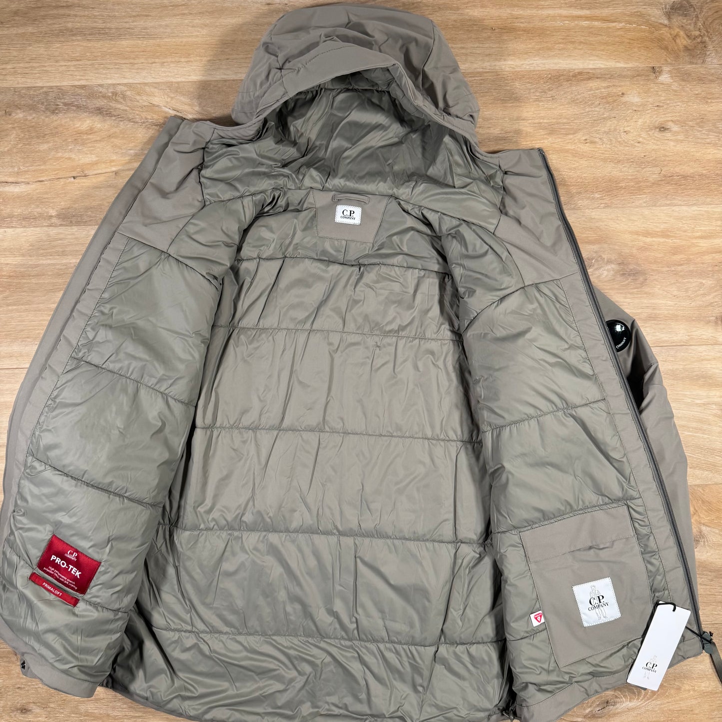 C.P. Company Pro-Tek Padded Lens Jacket in Fungi Grey