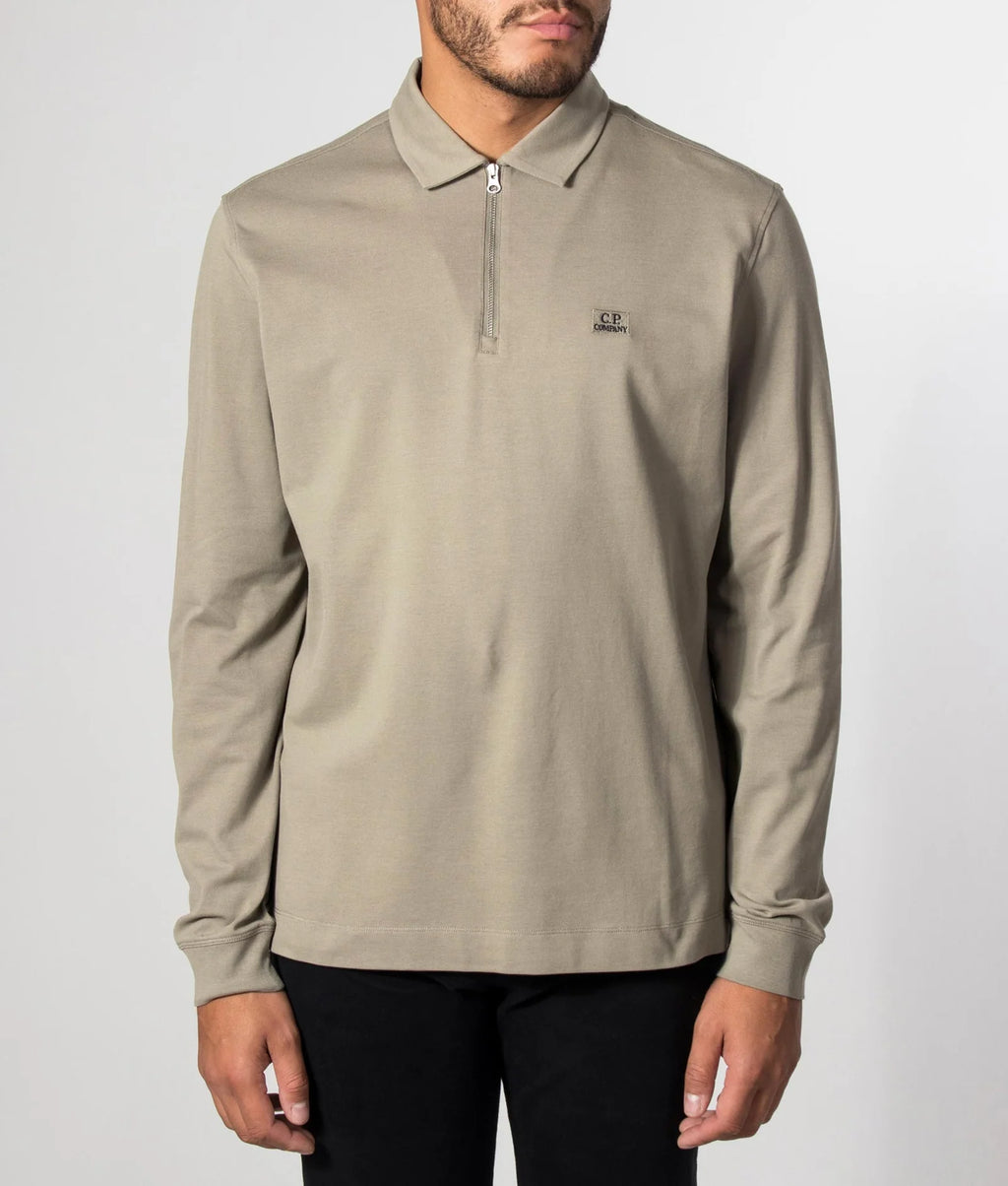 C.P. Company Stretch Piquet Long Sleeve Zip Polo in Fallen Rock - Beige