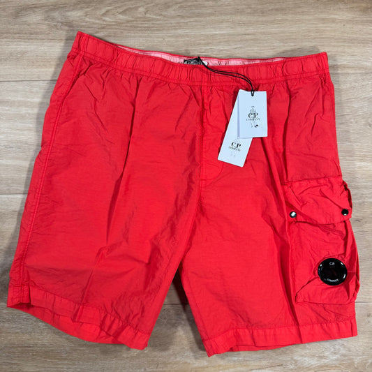 C.P. Company Flatt Nylon Cargo Lens Swim Shorts in Poinciana - Orange