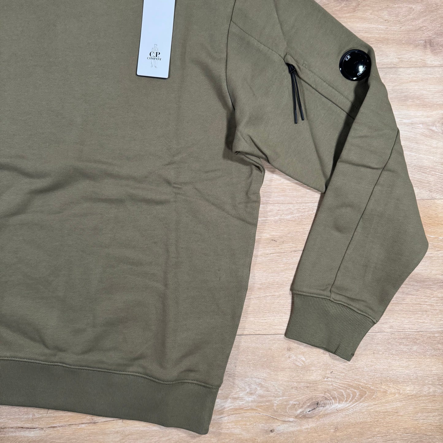 C.P. Company Diagonal Raised Fleece Crewneck Lens Sweatshirt in Capers Green