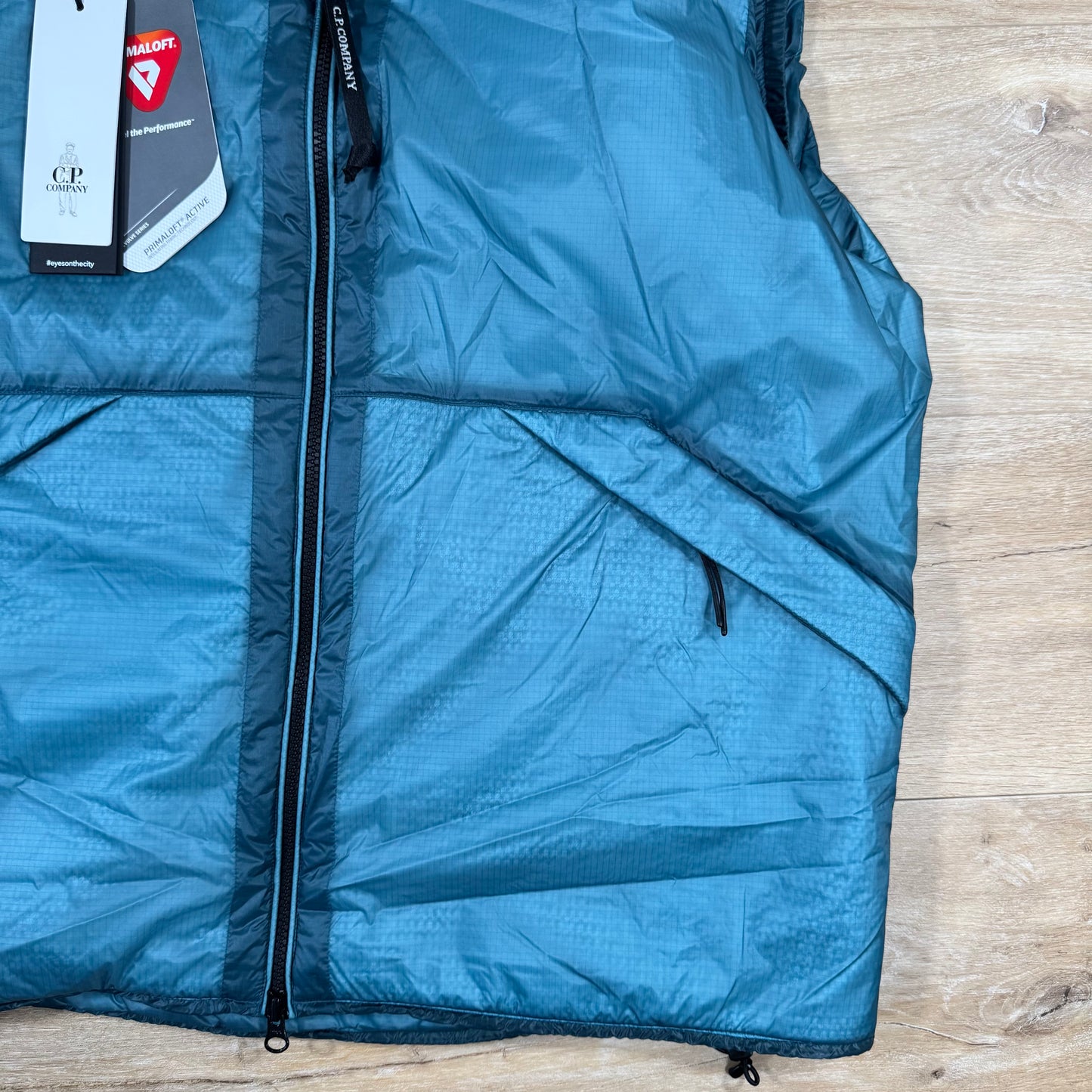 C.P. Company Nada Shell Goggle Padded Gilet in Aegean Blue