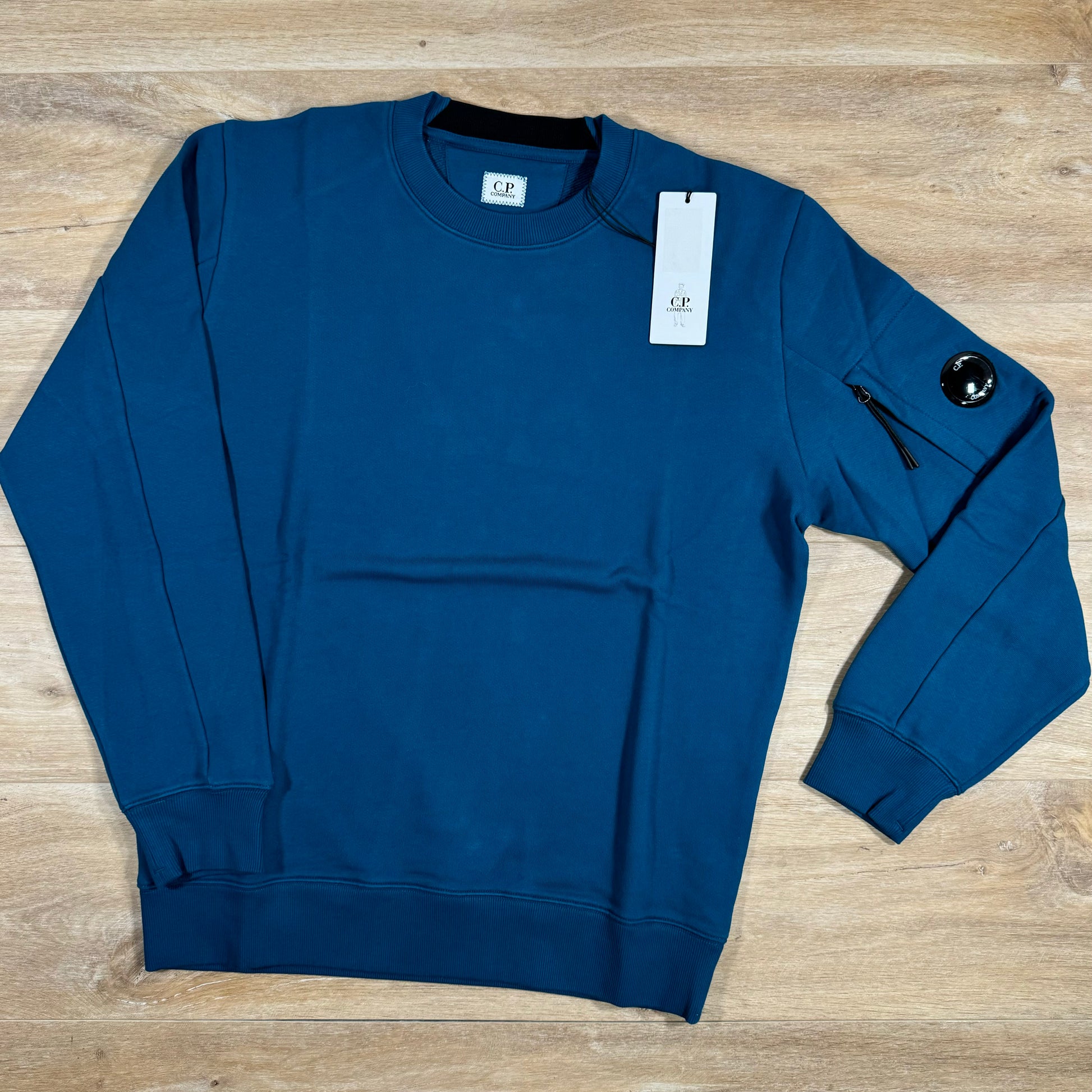 C.P. Company Diagonal Raised Lens Sweatshirt in Ink Blue LABEL MENSWEAR