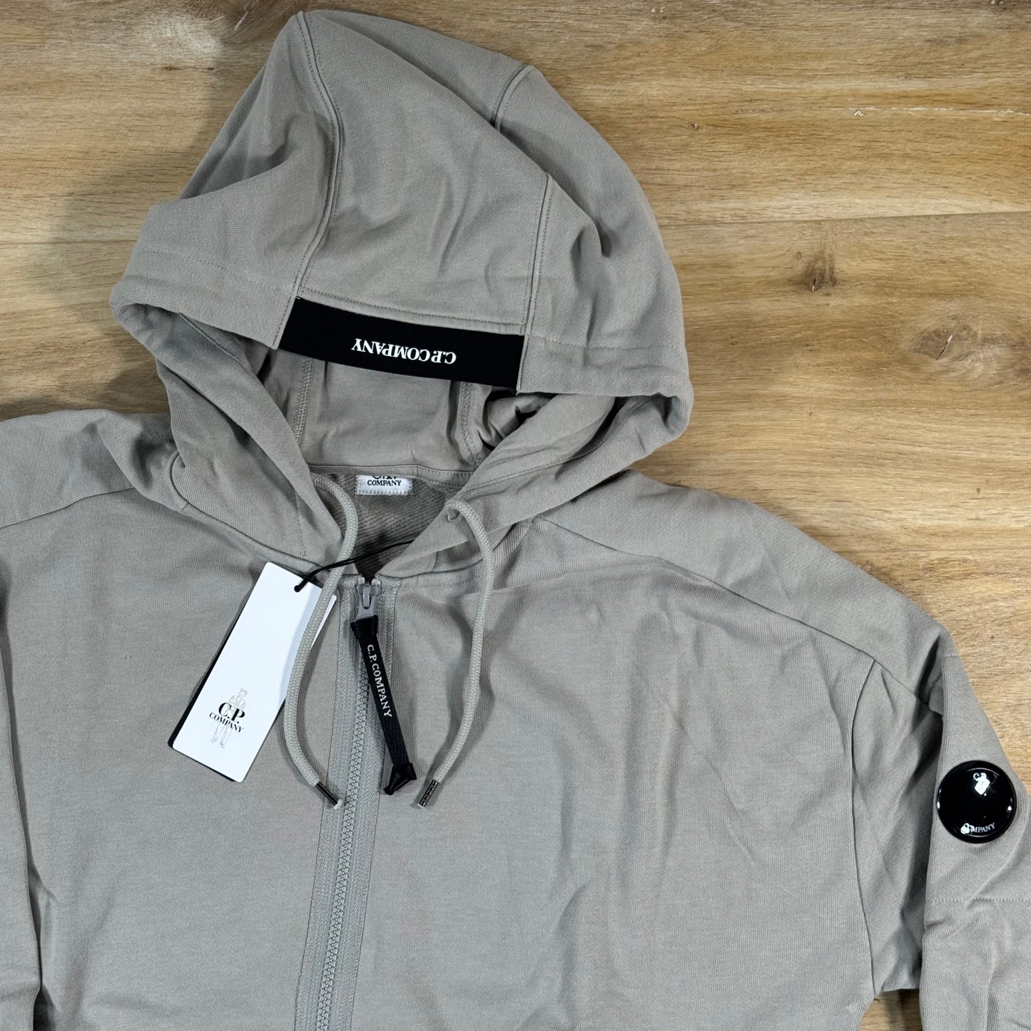 C.P. Company Diagonal Raised Zipped Lens Hoodie in Dove