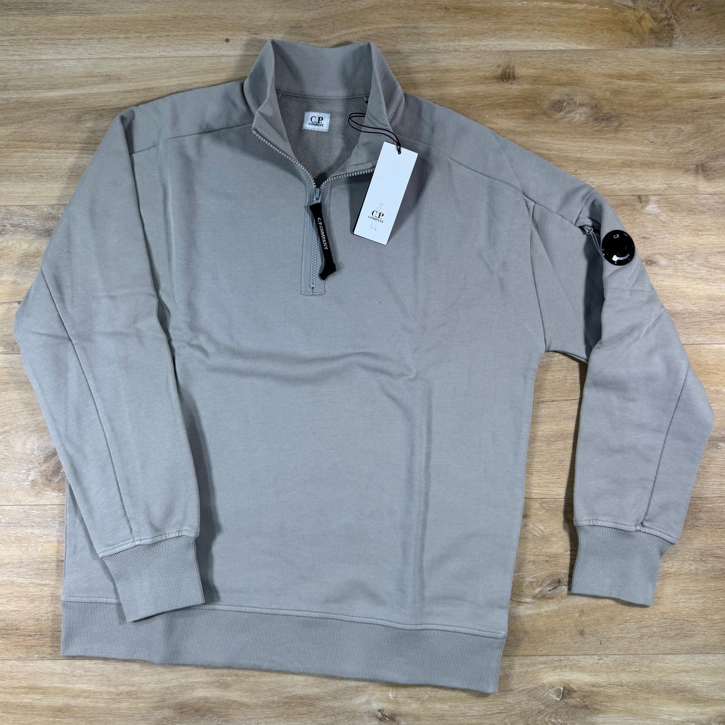 C.P. Company Diagonal Raised Half-Zip Lens Sweatshirt in Dove