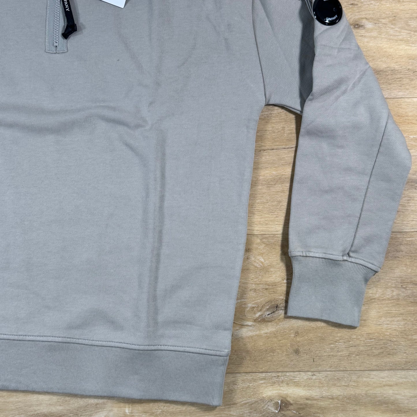 C.P. Company Diagonal Raised Half-Zip Lens Sweatshirt in Dove