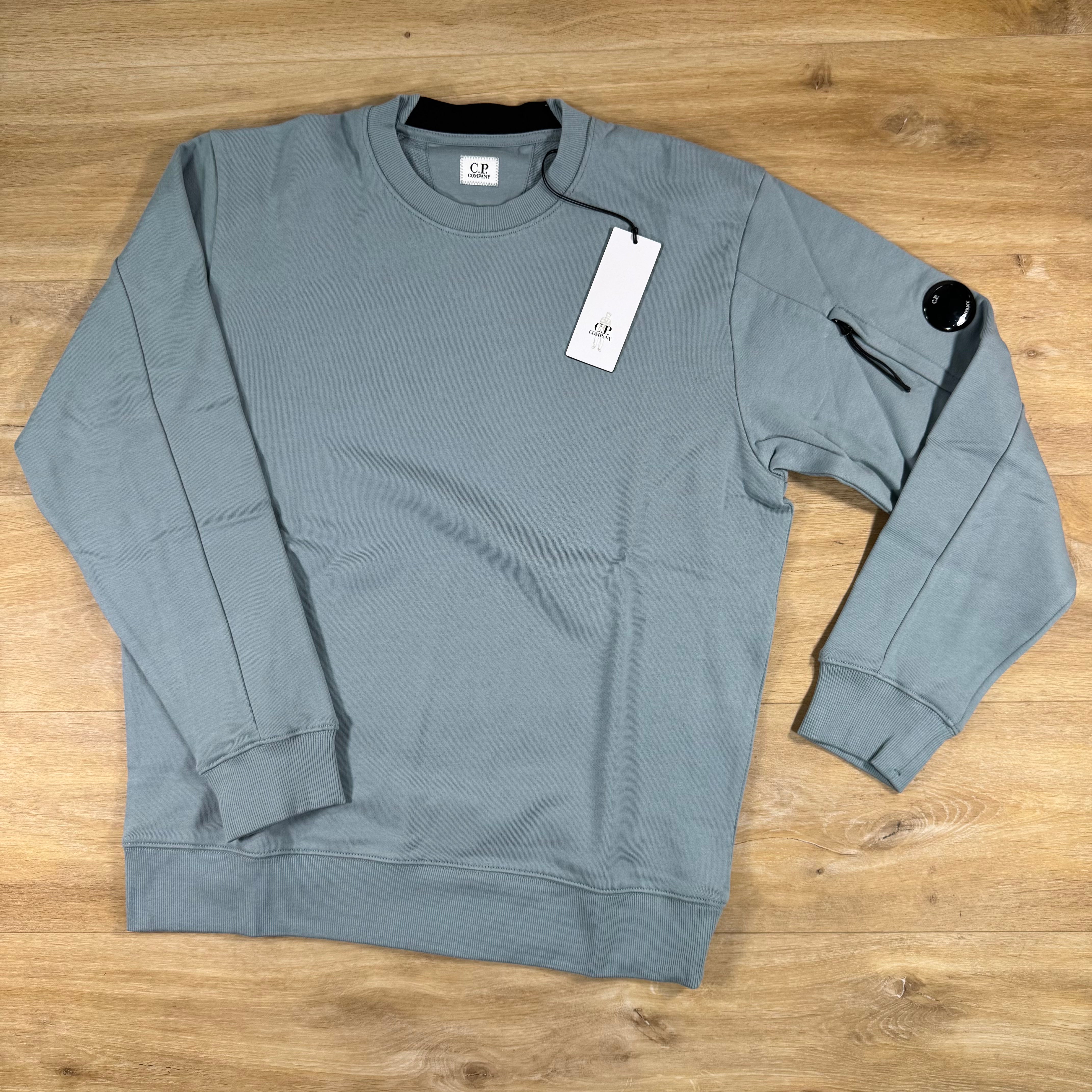 C.P. Company Diagonal Raised Fleece Crewneck Lens Sweatshirt in Silver Blue