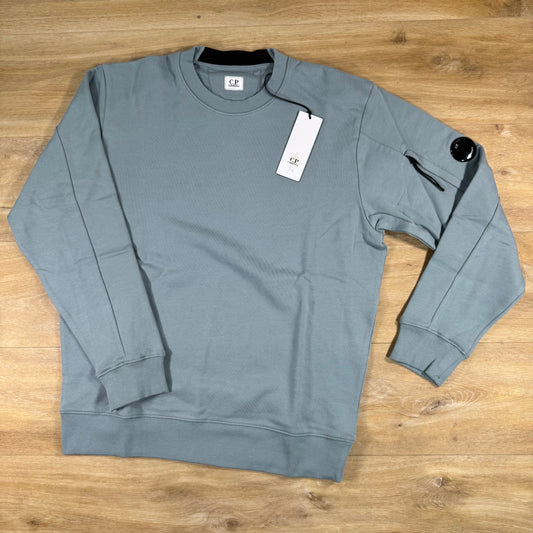 C.P. Company Diagonal Raised Fleece Crewneck Lens Sweatshirt in Silver Blue