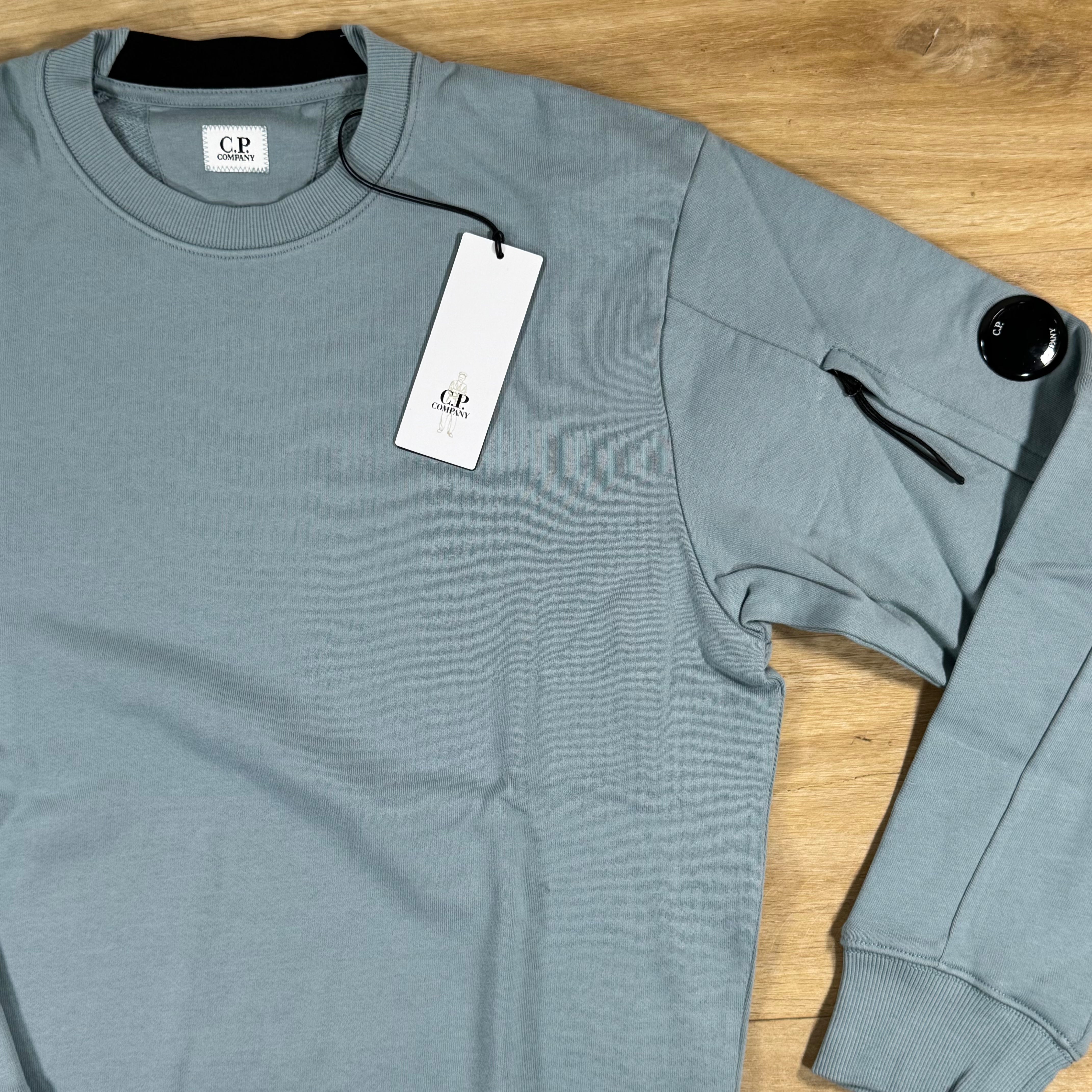 C.P. Company Diagonal Raised Fleece Crewneck Lens Sweatshirt in Silver Blue
