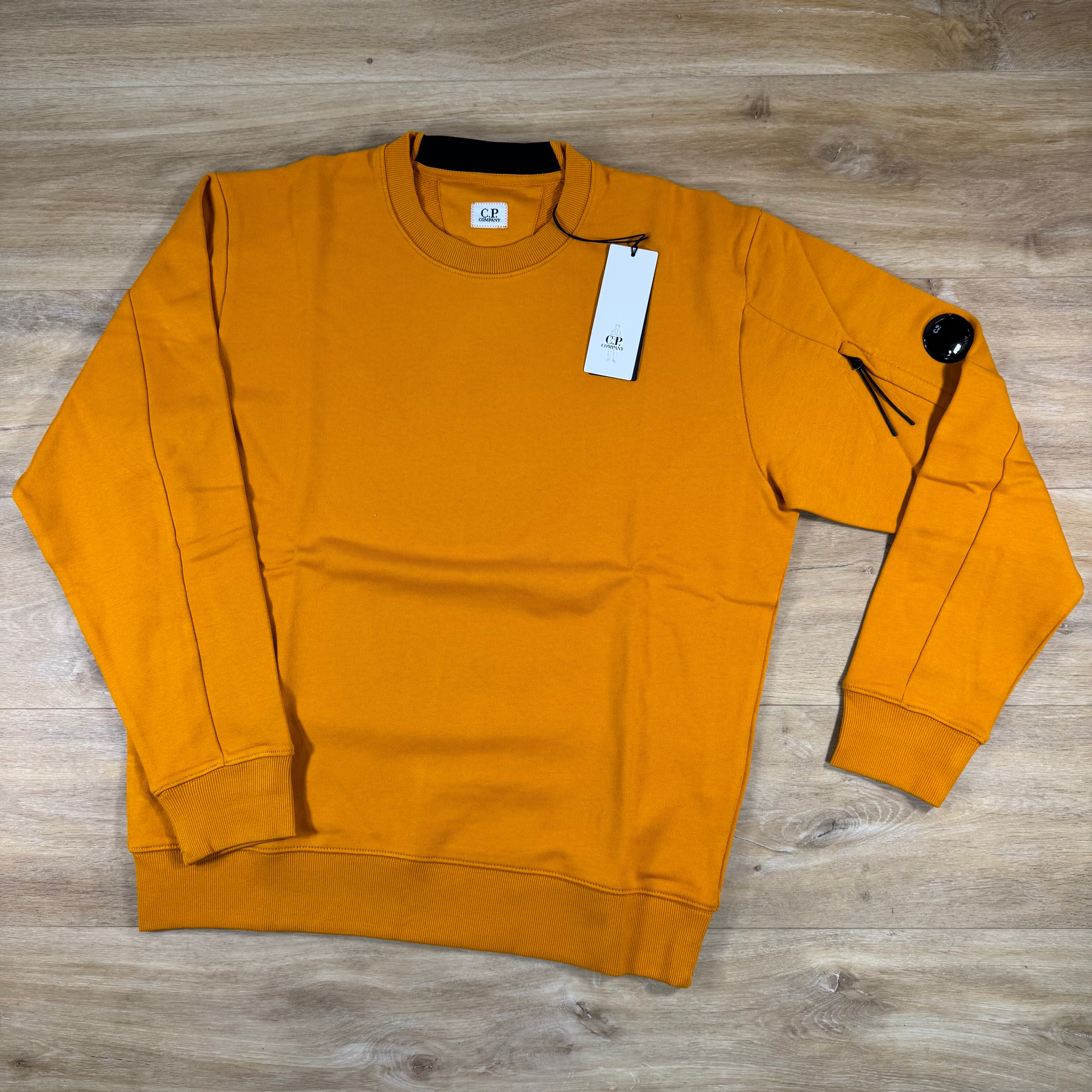 C.P. Company Diagonal Raised Fleece Crewneck Lens Sweatshirt in Desert Sun