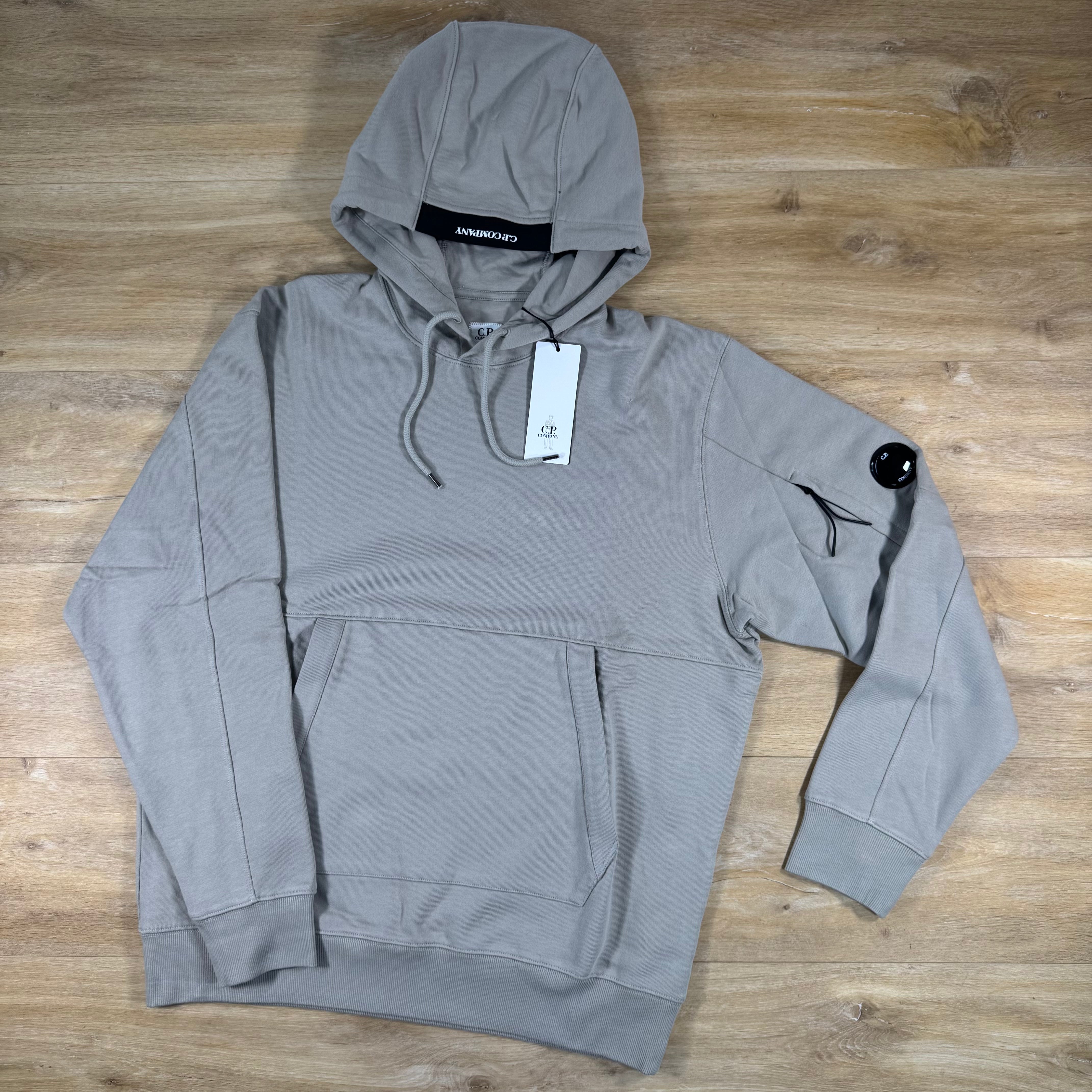 C.P. Company Diagonal Raised Fleece Lens Hoodie in Dove