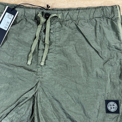 Stone Island Nylon Metal Button Swim Shorts in Military Green
