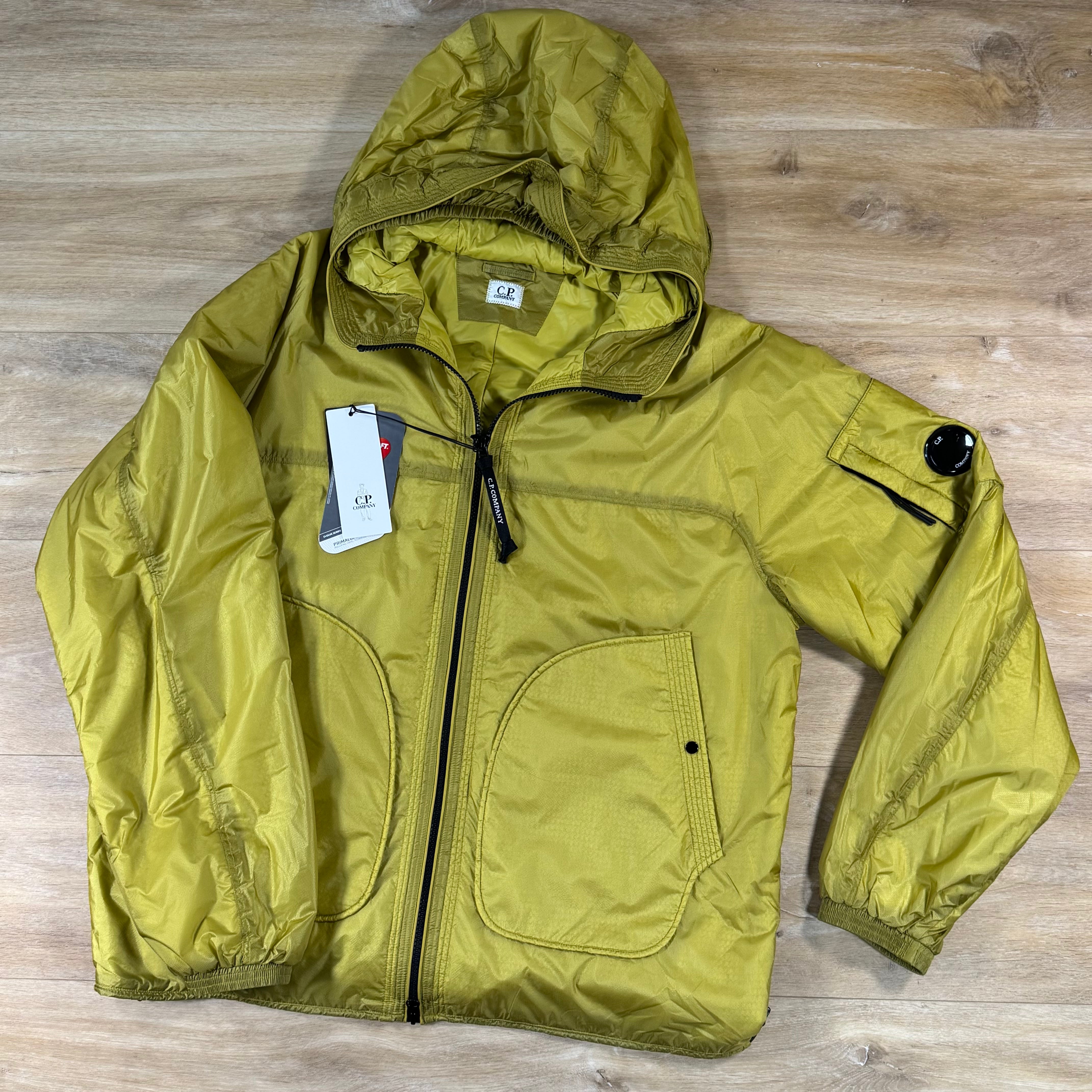 C.P. Company Nada Shield Packable Primaloft Evolve Lens Jacket in Antique Moss - Yellow