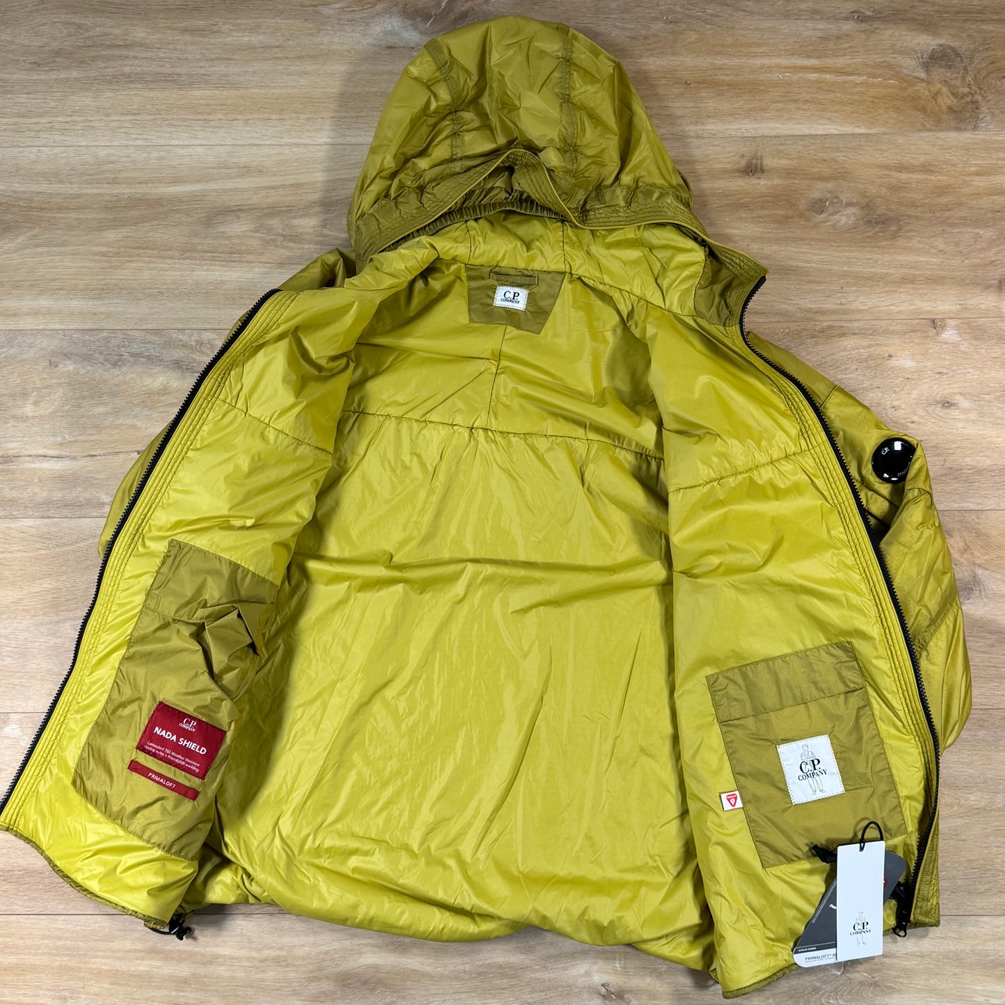 C.P. Company Nada Shield Packable Primaloft Evolve Lens Jacket in Antique Moss - Yellow